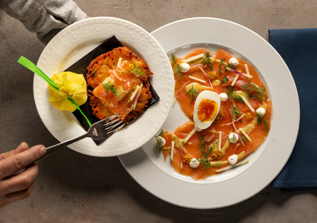 Potato Latkes with smoked salmon, soft egg, pickled mustard seed, creme fraiche and arugula from Tisza Bistro chef/owner Krisztian Karkus Monday, February 12, 2024 in Healdsburg. (Photo by John Burgess/The Press Democrat)