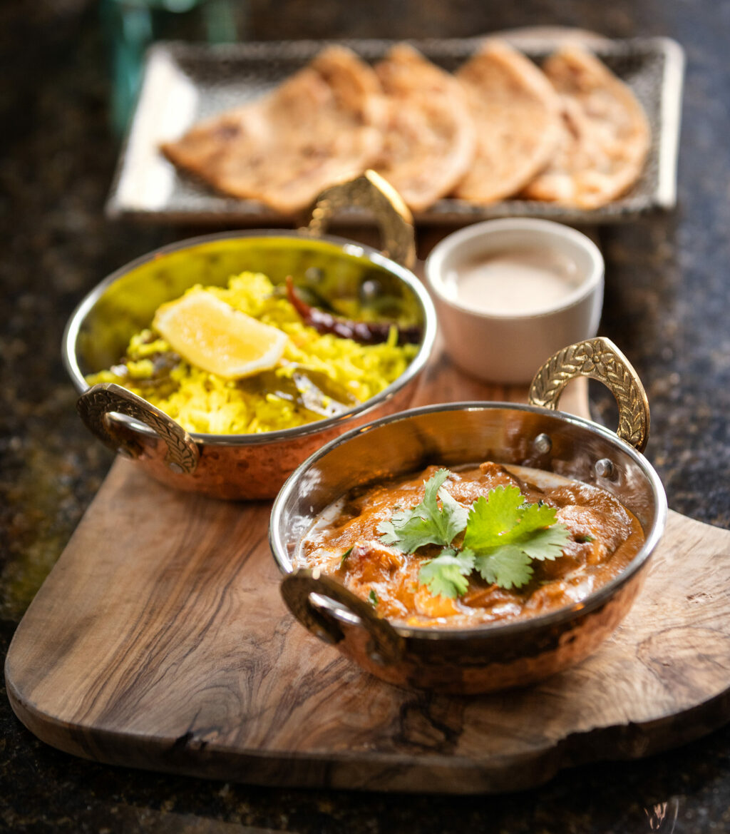 Tikka Masala chicken, lemon rice, paratha and raita from Studio Barndiva Friday, February 23, 2024 in Healdsburg. (Photo by John Burgess/The Press Democrat)