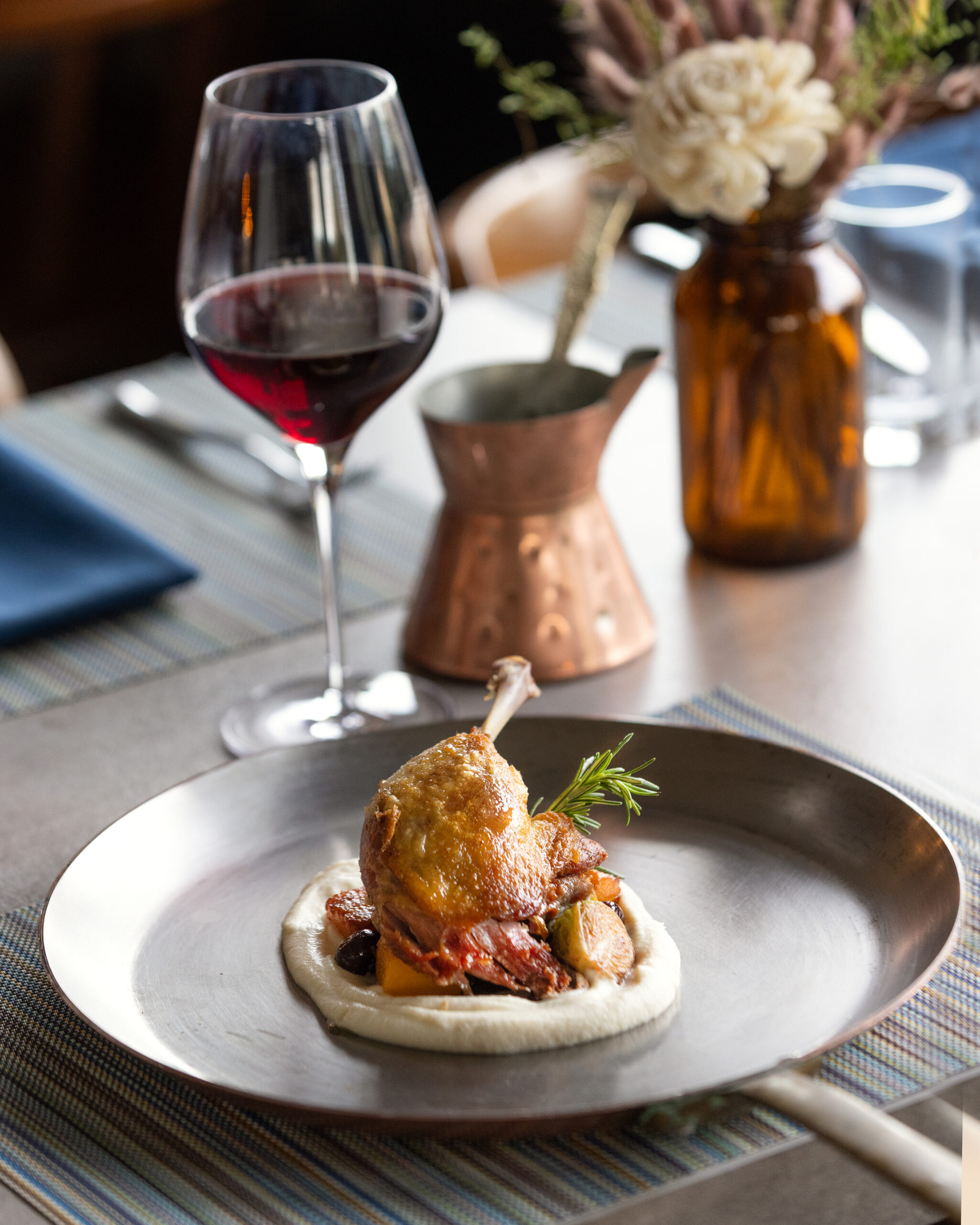 Duck Leg Confit with celery root purée, caramelized vegetables, griottes and duck jus from Tisza Bistro chef/owner Krisztian Karkus Monday, February 12, 2024 in Healdsburg. (Photo by John Burgess/The Press Democrat)