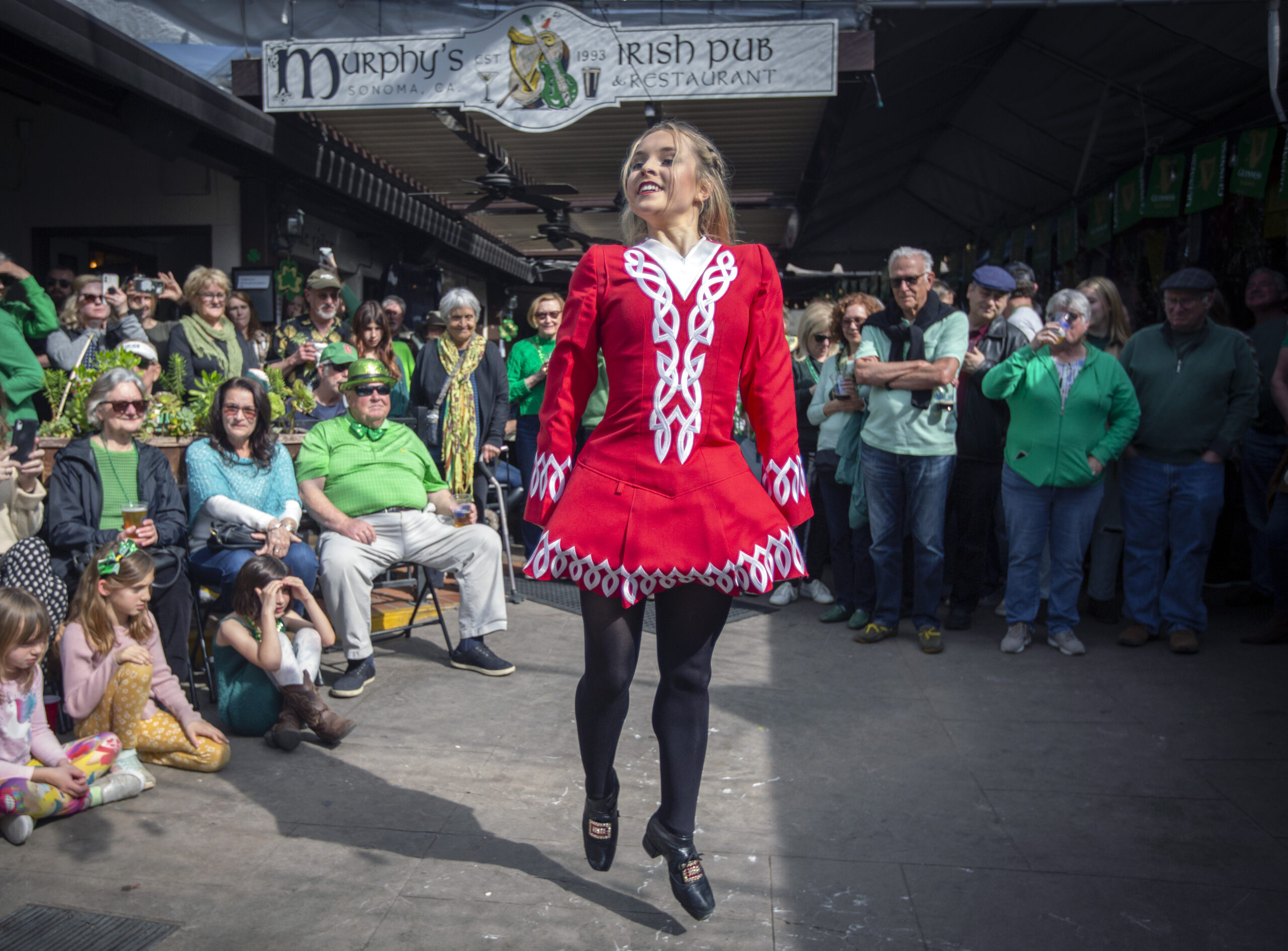 An Irish dancer performs during a St. Patrick’s Day celebration at Murphy’s Irish Pub 