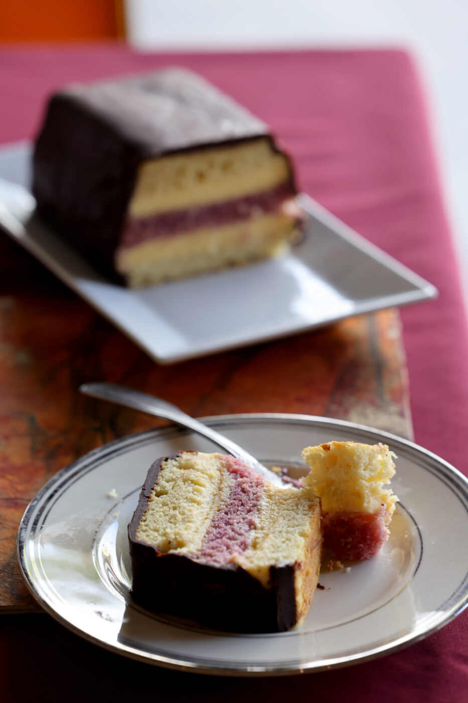 Zuppa Inglese, a classic Bolognese dessert, made with layers of custard and cake, with Alchermes liqueur and covered in chocolate ganash at Portico in Sebastopol, Wednesday, April 24, 2024. (Beth Schlanker / The Press Democrat)