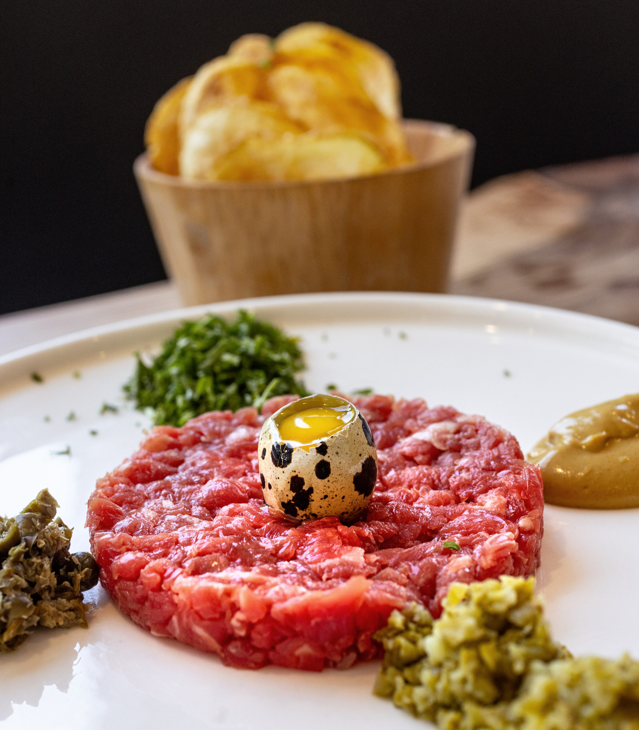 tableside steak tartare from Petaluma's Brigitte Bistro is one of Sonoma County's essential dishes