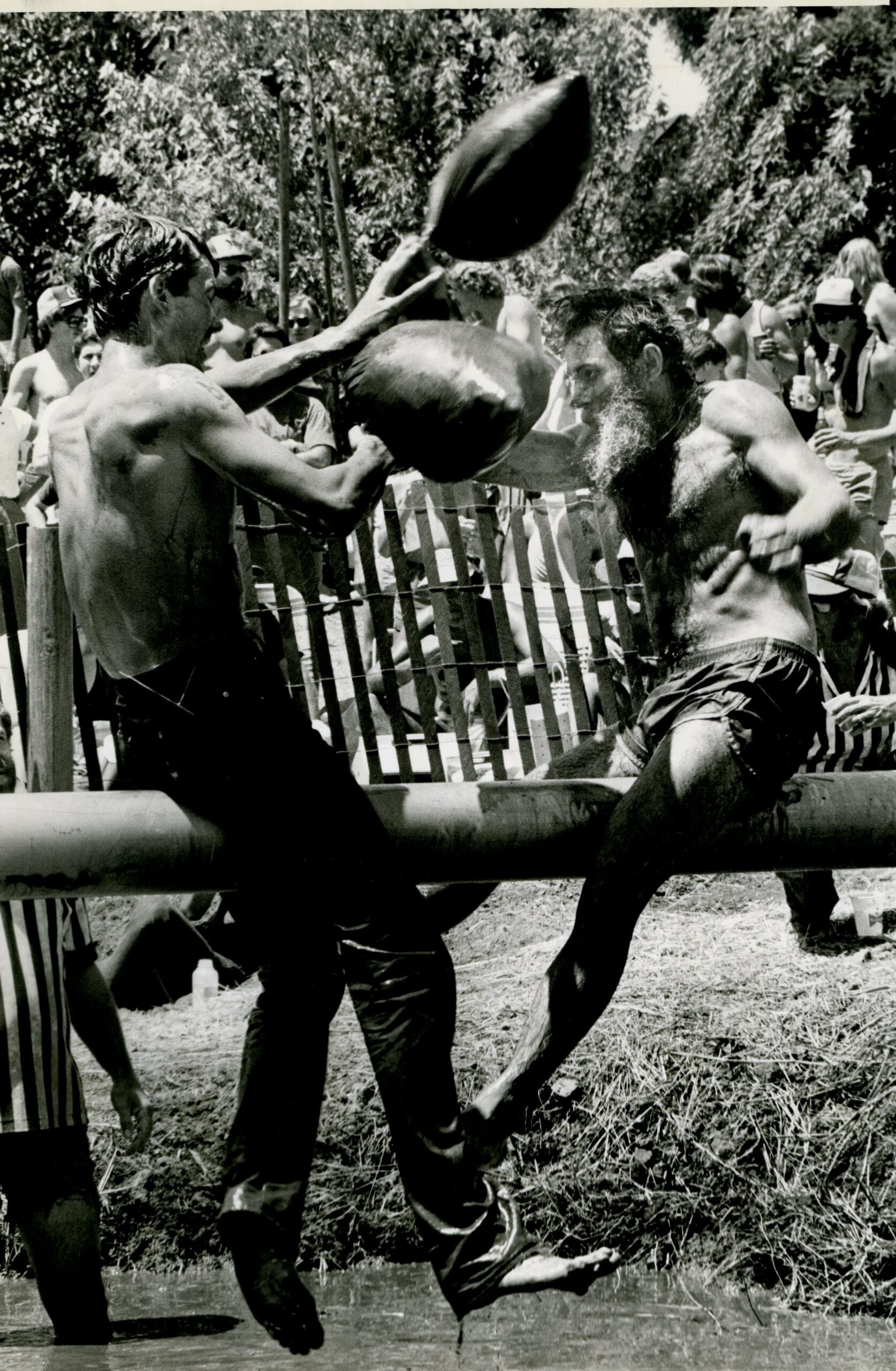 John Tremann and Steve Herron took swings at each other during a pillow fight competition in Kenwood on July 4, 1984. The World Pillow Fight Championships originated in Kenwood. (The Press Democrat, file)