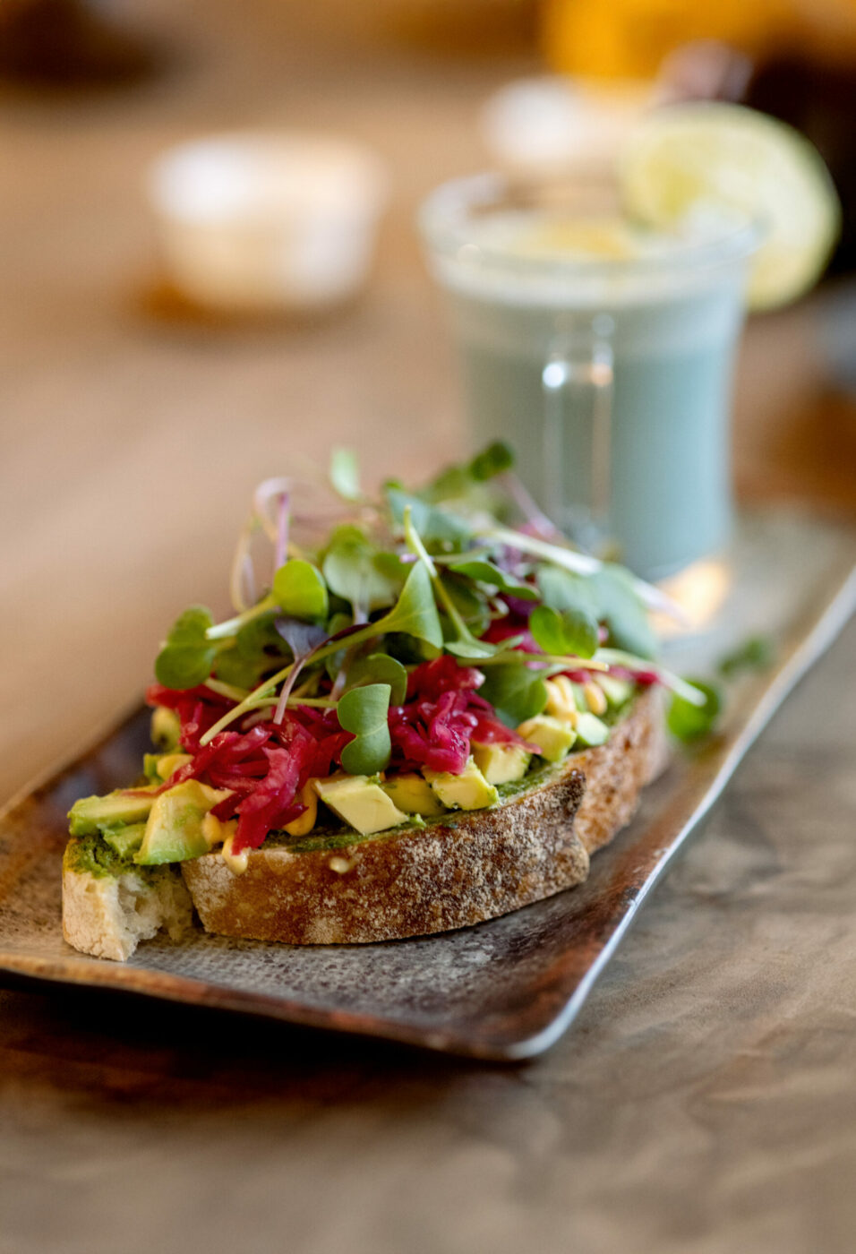 The Fancy Toast with local sourdough, avocado or pesto, sprouts, kraut and olive oil from Soft Medicine Sanctuary Friday, November 22, 2024, in Sebastopol. (John Burgess / The Press Democrat)