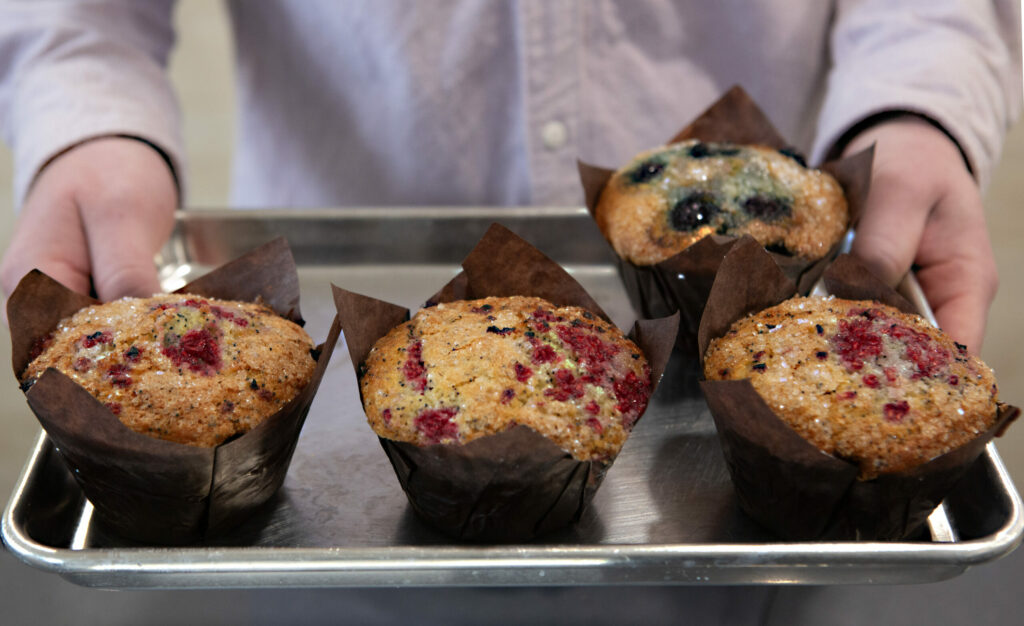 Popular items include the lemon raspberry poppy seed muffin as well as the blueberry. Baker Robin Haviland prepares all of the baked goods on site at Småstad Coffee Roasters on Broadway. Photo taken on Wednesday, Nov. 13, 2024. (Robbi Pengelly / Sonoma Index-Tribune)