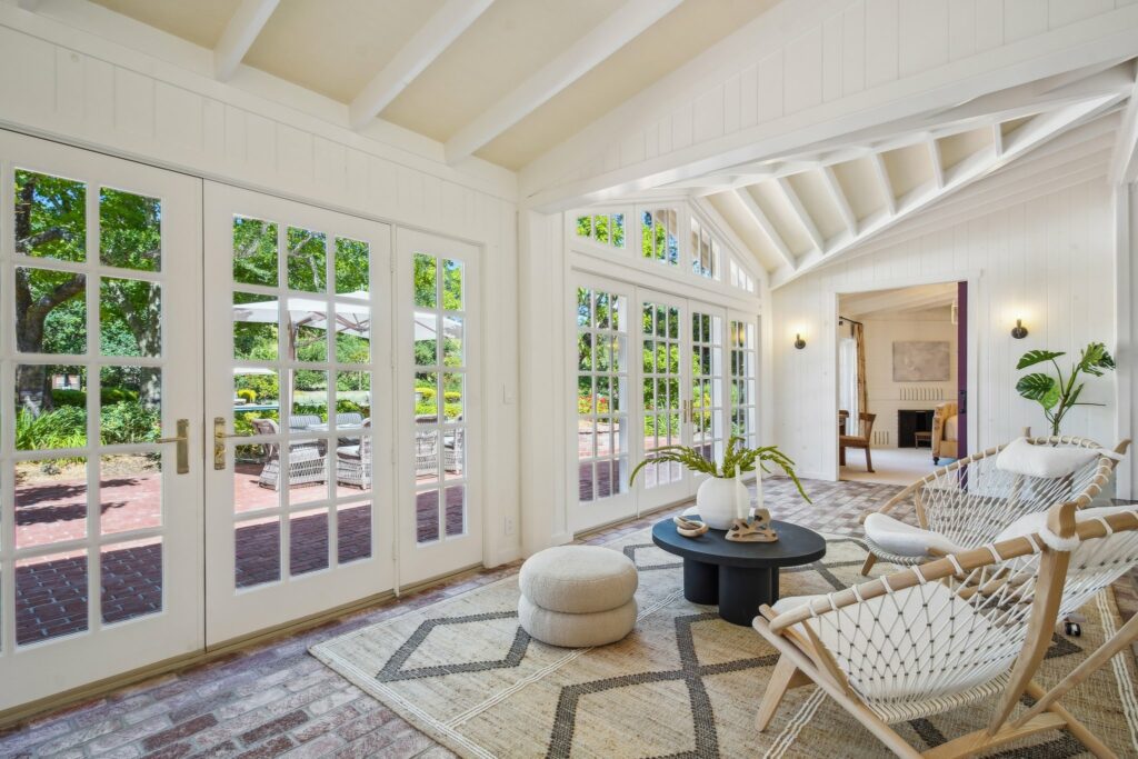 Enclosed patio off of great room. (Zillow Media Experts / Sotheby’s International Realty)