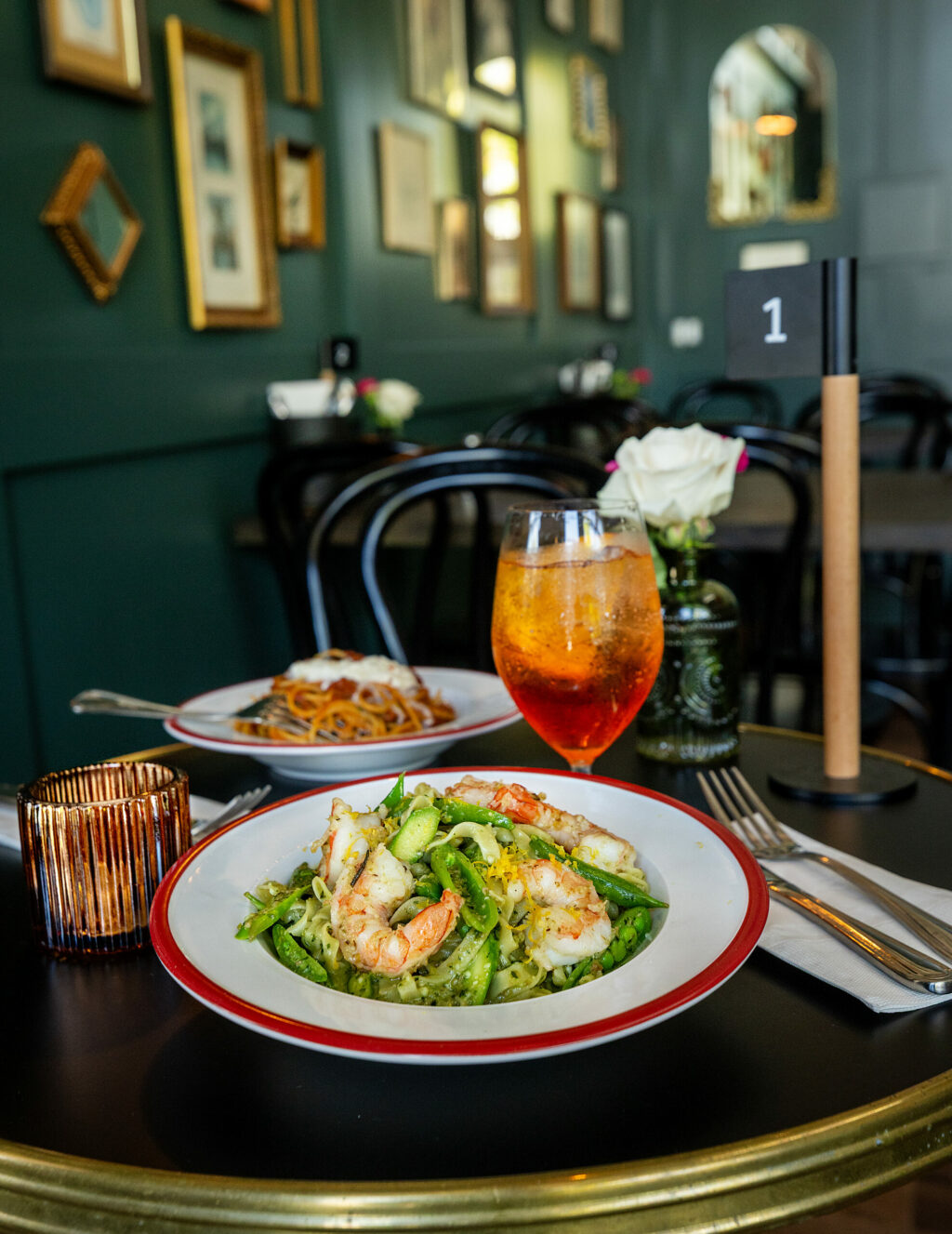 Tagliatelle with pesto, snap peas and asparagus and a Cappelletti Spritz from Acre Pasta, Friday, May 30, 2025 in Sebastopol’s Barlow District. (John Burgess / The Press Democrat)