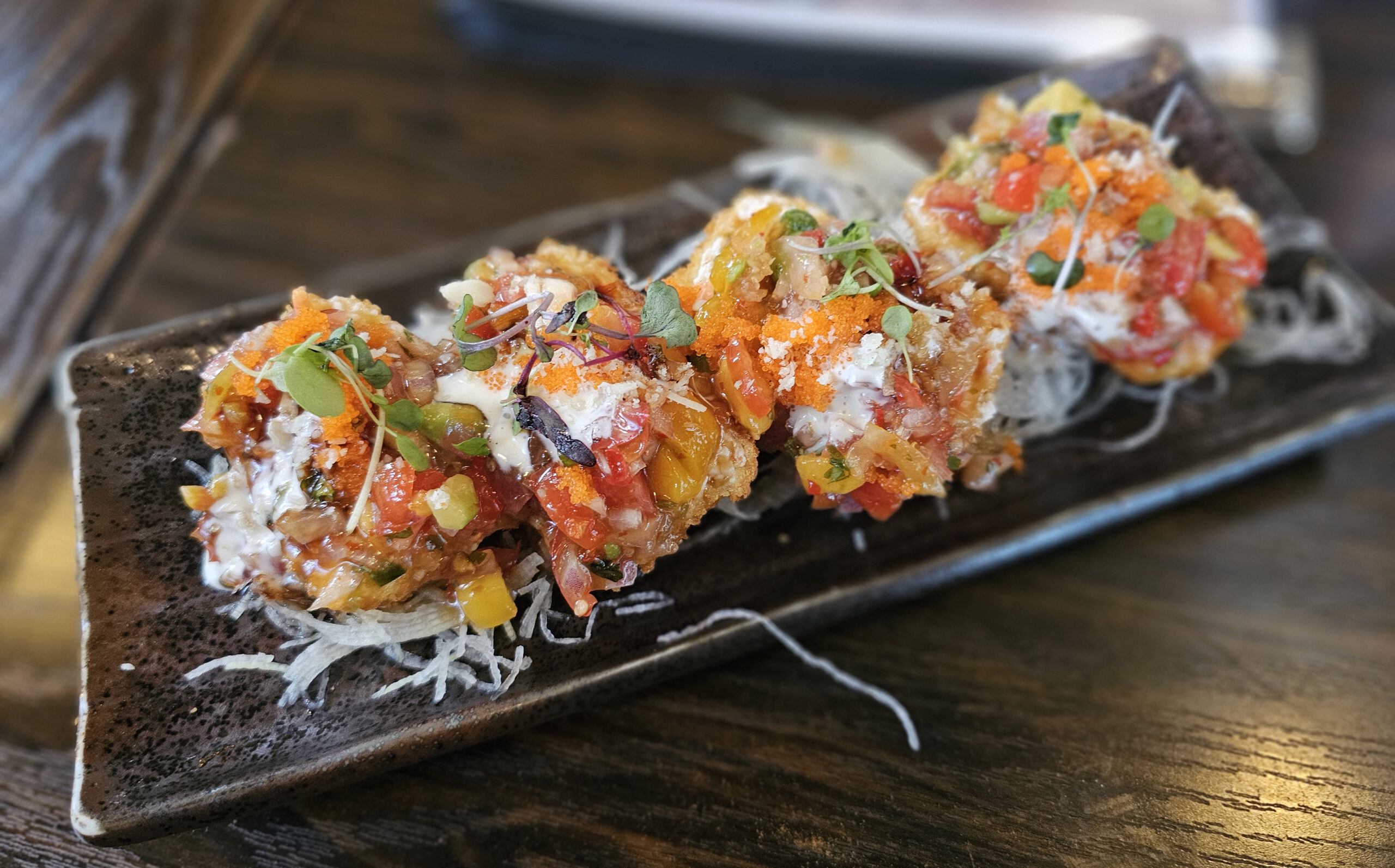 Crab puffs with yuzu aioli from Sushiko in Rohnert Park. A little messy, but so is life. (Heather Irwin / The Press Democrat)
