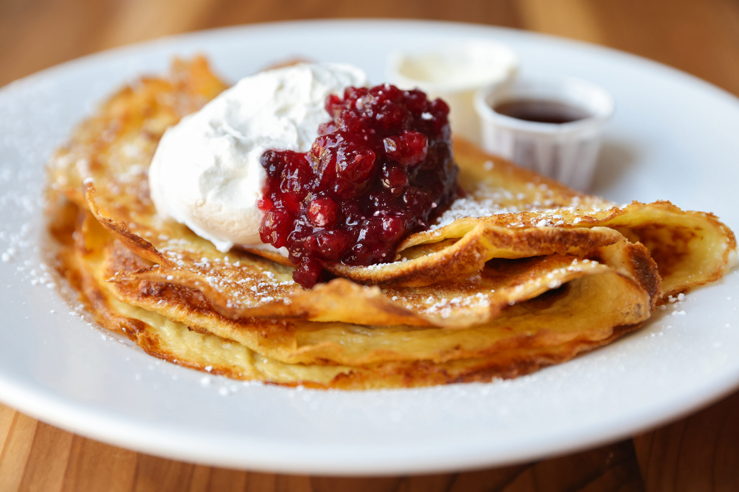 Pancakes from the North, features thin Swedish pancakes, lingonberries and vanilla cream, maple syrup, and butter, at Baked on the River in Guerneville on Thursday, August 7, 2025. (Christopher Chung/The Press Democrat)