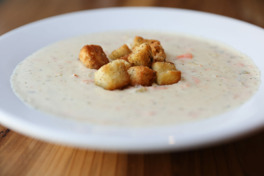 Salmon Chowder, featuring wild king salmon, potatoes, and vegetables, at Baked on the River in Guerneville on Thursday, August 7, 2025. (Christopher Chung/The Press Democrat)