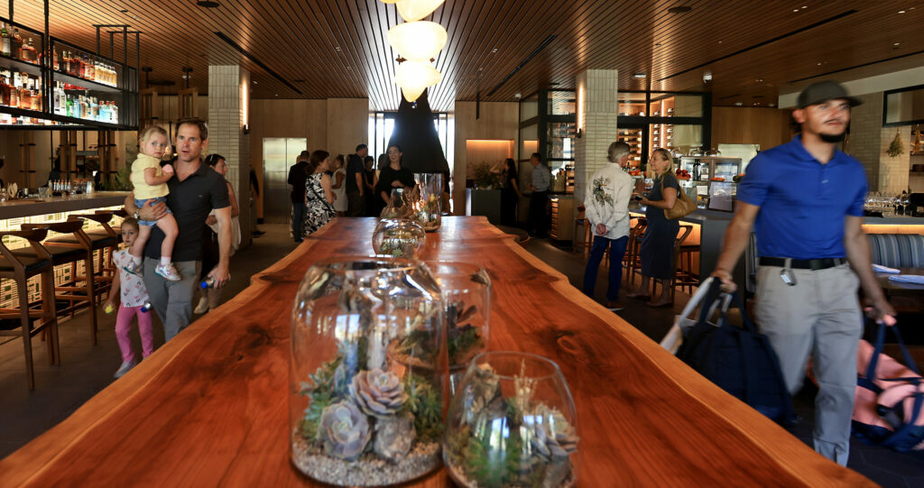 At Appellation Healdsburg, guests walk to their rooms during the formal opening of the resort, Friday, Sept. 12, 2025. (The Press Democrat)