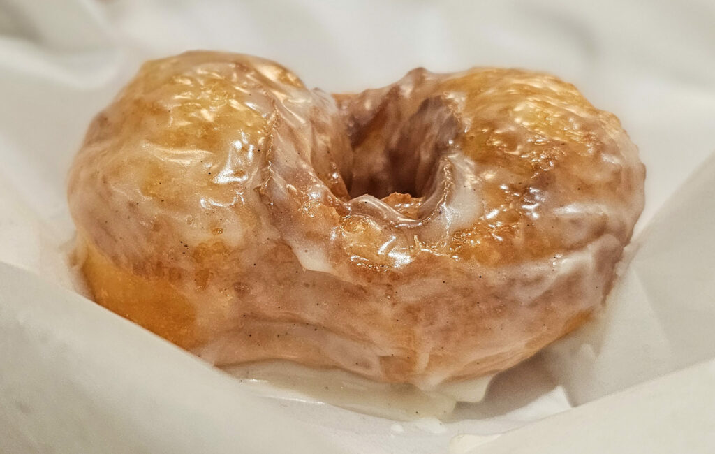 They may be homely, but they're tasty. A seasonal Gravenstein Apple Cider glazed doughnut at the newly opened Dutch Door Donuts in Healdsburg. (Heather Irwin/Sonoma Magazine)