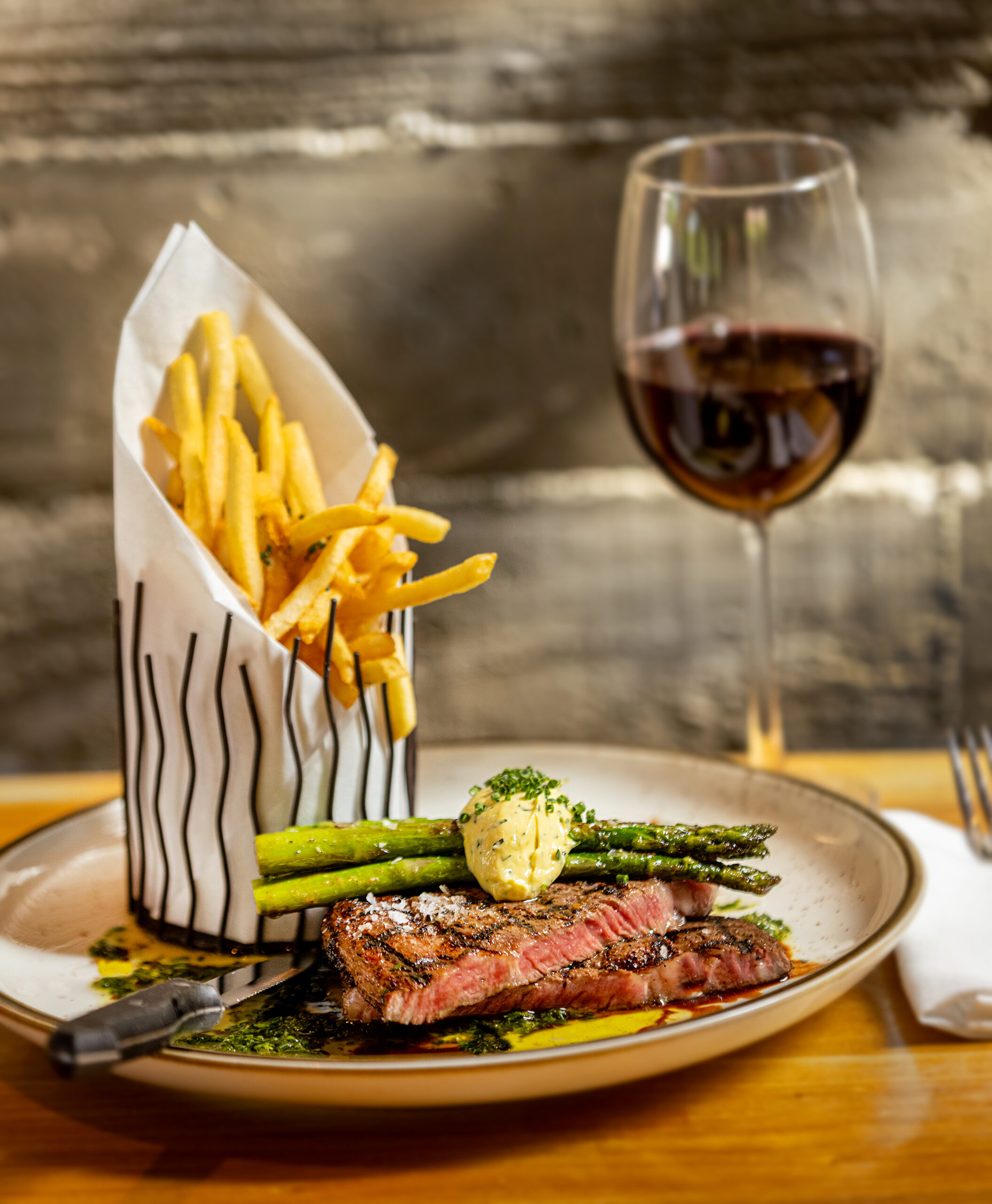 Steak Frites with Creekstone Angus ribeye, grilled asparagus and Béarnaise from Spoonbar Thursday, June 5, 2025 in Healdsburg. (John Burgess / The Press Democrat)