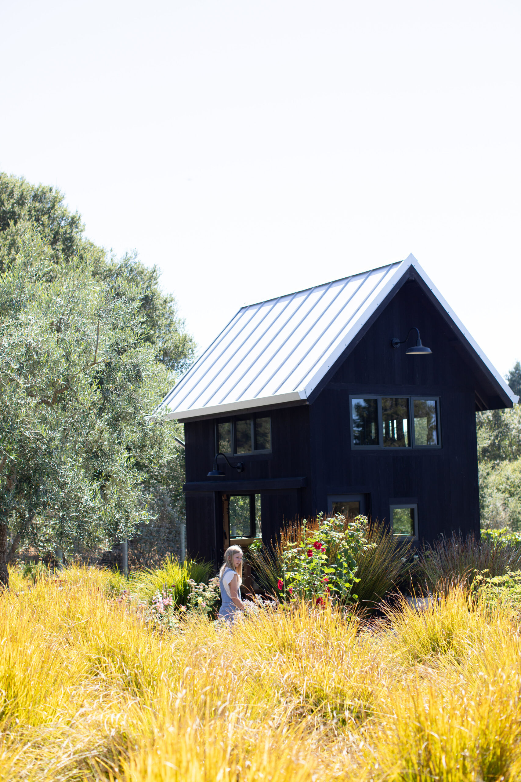 A two-story potting shed in the family's garden provides plenty of space for garden tools and a crafts room where Cristina Hobbs and her daughters spend many happy hours creating and sewing. In October, the girls turn the shed into a haunted house. (Eileen Roche / for Sonoma Magazine)