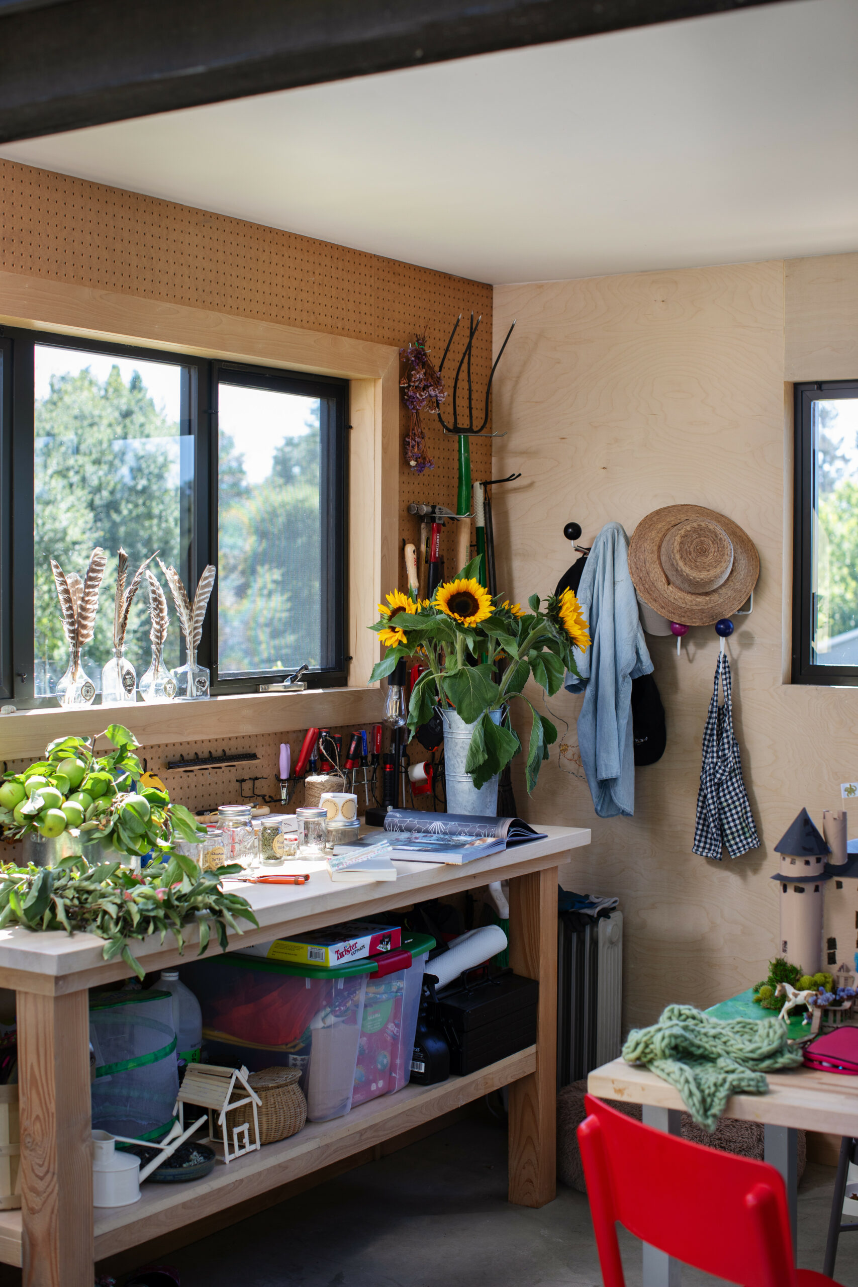 The two-story potting shed in the family's garden provides plenty of space for garden tools and a crafts room where Cristina Hobbs and her daughters spend many happy hours creating and sewing. In October, the girls turn the shed into a haunted house. (Eileen Roche / for Sonoma Magazine)