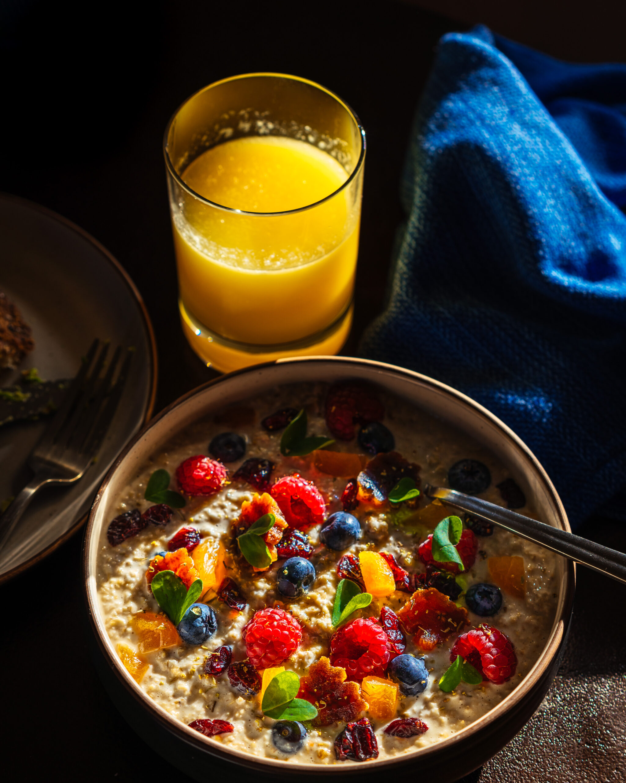 A bowl of overnight oatmeal topped with fresh berries. (Emma K Creative / Sonoma County Tourism)