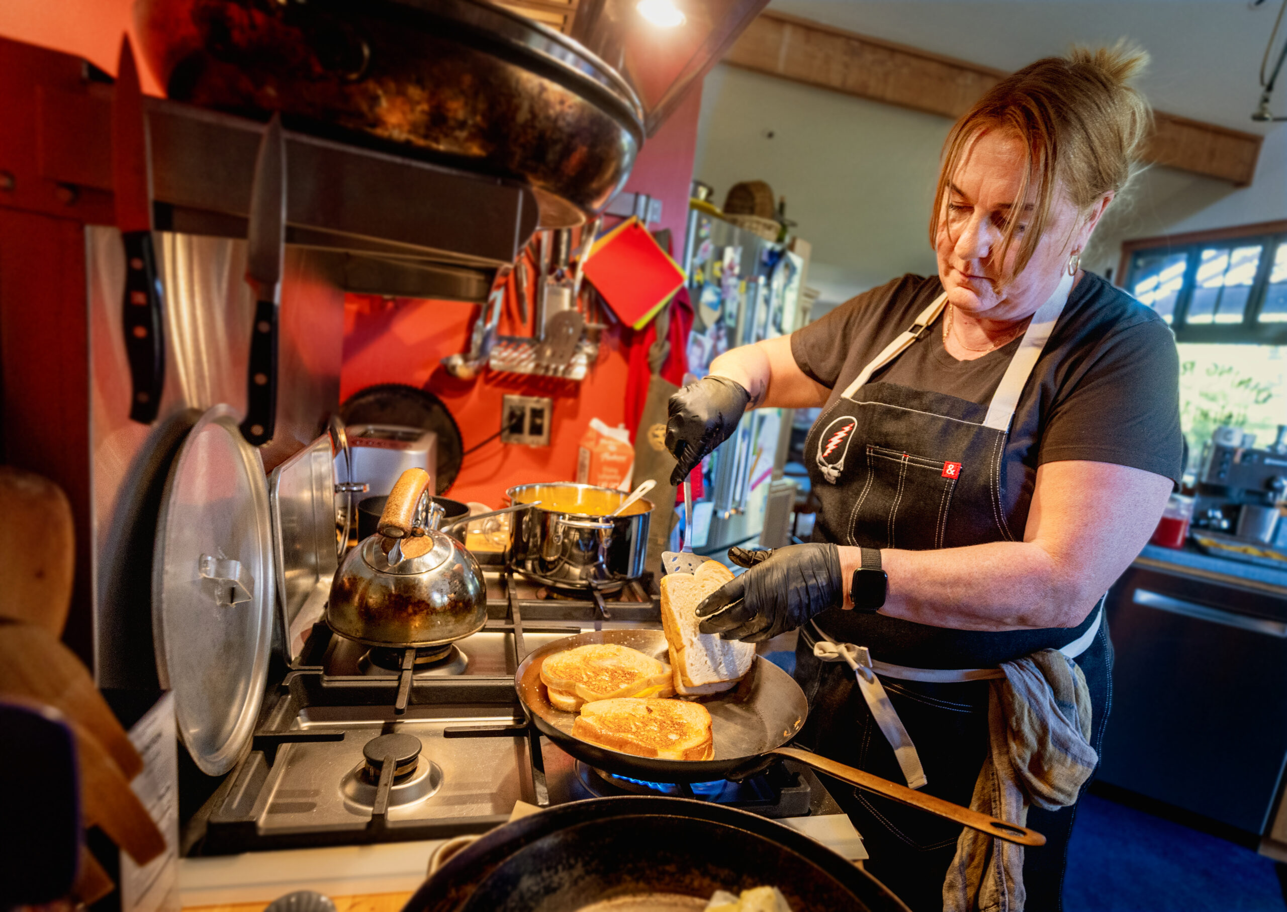 Private chef Jessie Keilt is the daughter of Grateful Dead lyricist Robert Hunter. After spending the previous day on stage introducing Dead & Company, Jessie created a meal for Trixie Garcia, daughter of Jerry and Reya Hart, daughter of Mickey at the family home of longtime friend and Sonoma County winemaker Phil Coturri Tuesday, August 5, 2025 in Sonoma. (John Burgess / The Press Democrat)