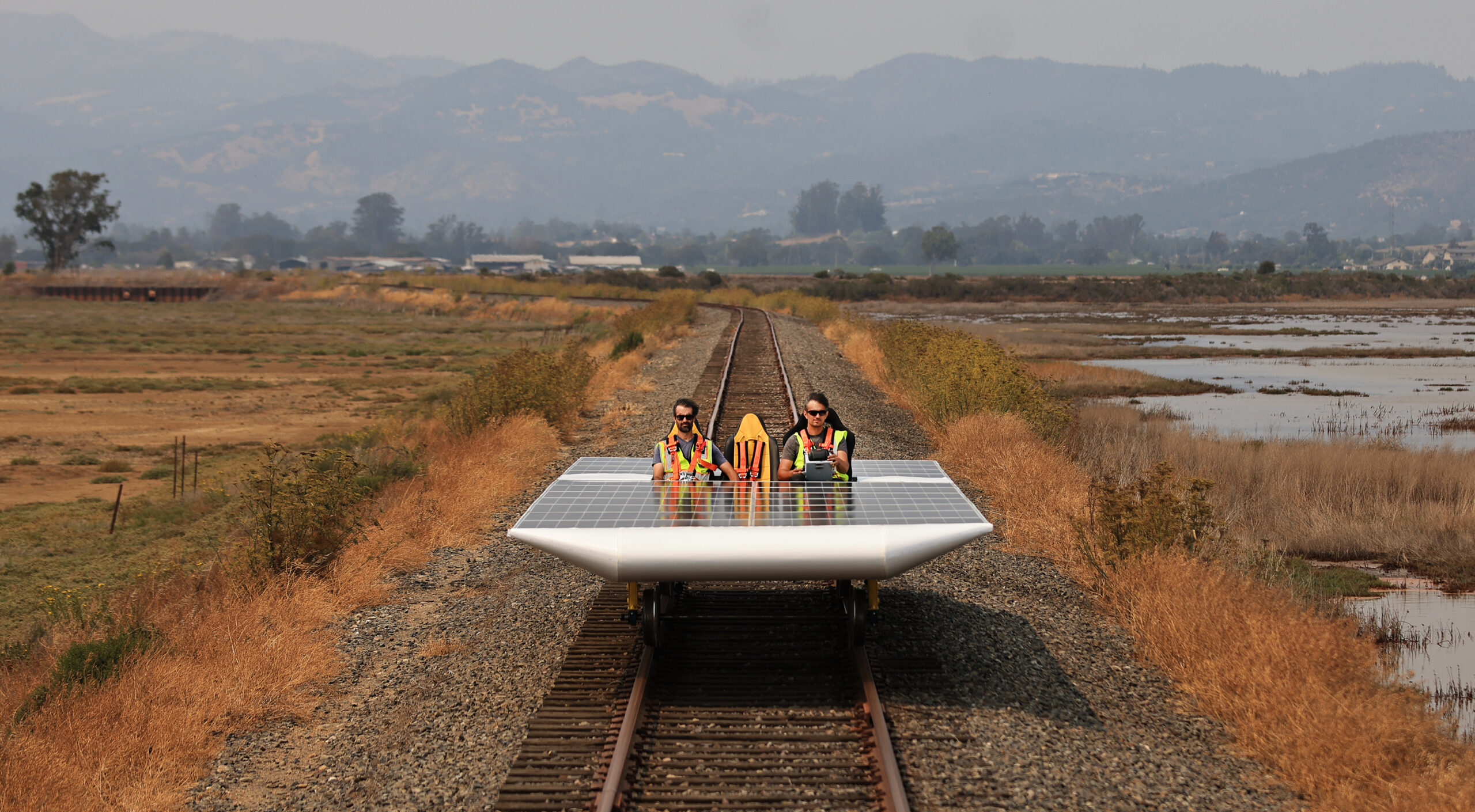 Eric Houston, left, and Marco Fucci di Napoli take the Solar Train out for a spin in the Schellville area of Sonoma County, Friday, Aug. 20, 2021 , where they will attempt a world speed record on Saturday. (Kent Porter / The Press Democrat) 