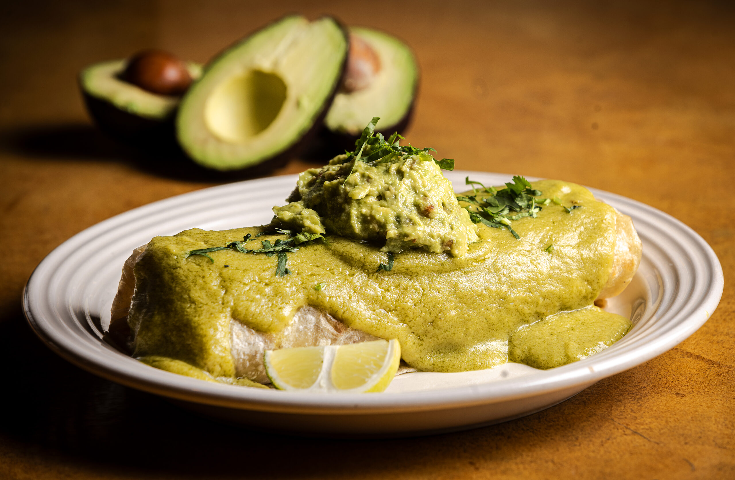 The Gratitude Burrito with refried beans, shredded yam and potato mixed, corn salsa, pico de gallo salsa, guacamole covered in a creamy jalapeño sauce rom Viva Mexicana Wednesday, January 29, 2025 in Sebastopol. (John Burgess / The Press Democrat)