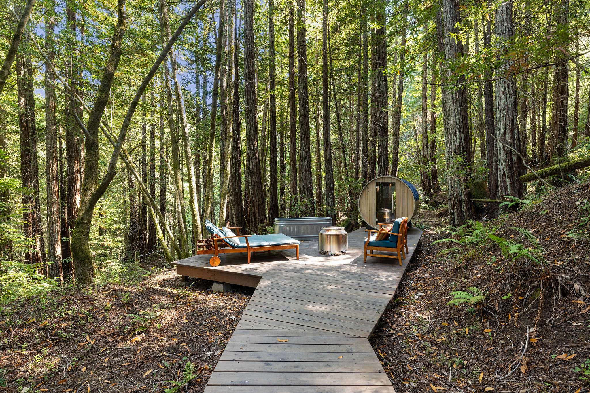 Outdoor sauna and seating area. (Open Homes Photography)