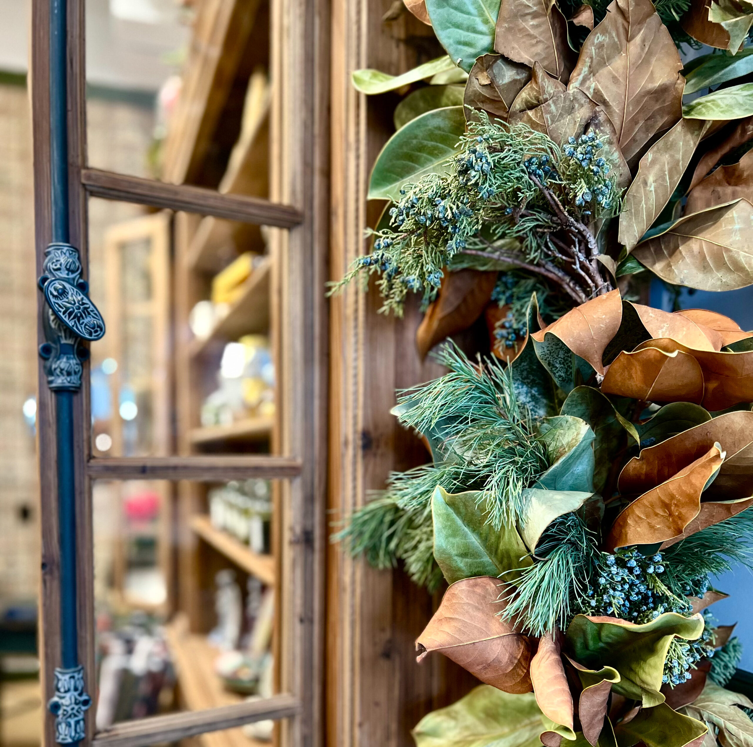 There’s magnolia garland and there’s pine and juniper garland. But Nicole Buttitta twisted the two together so the patina of the magnolia leaves contrasts beautifully with the greens. (Karen Kizer)