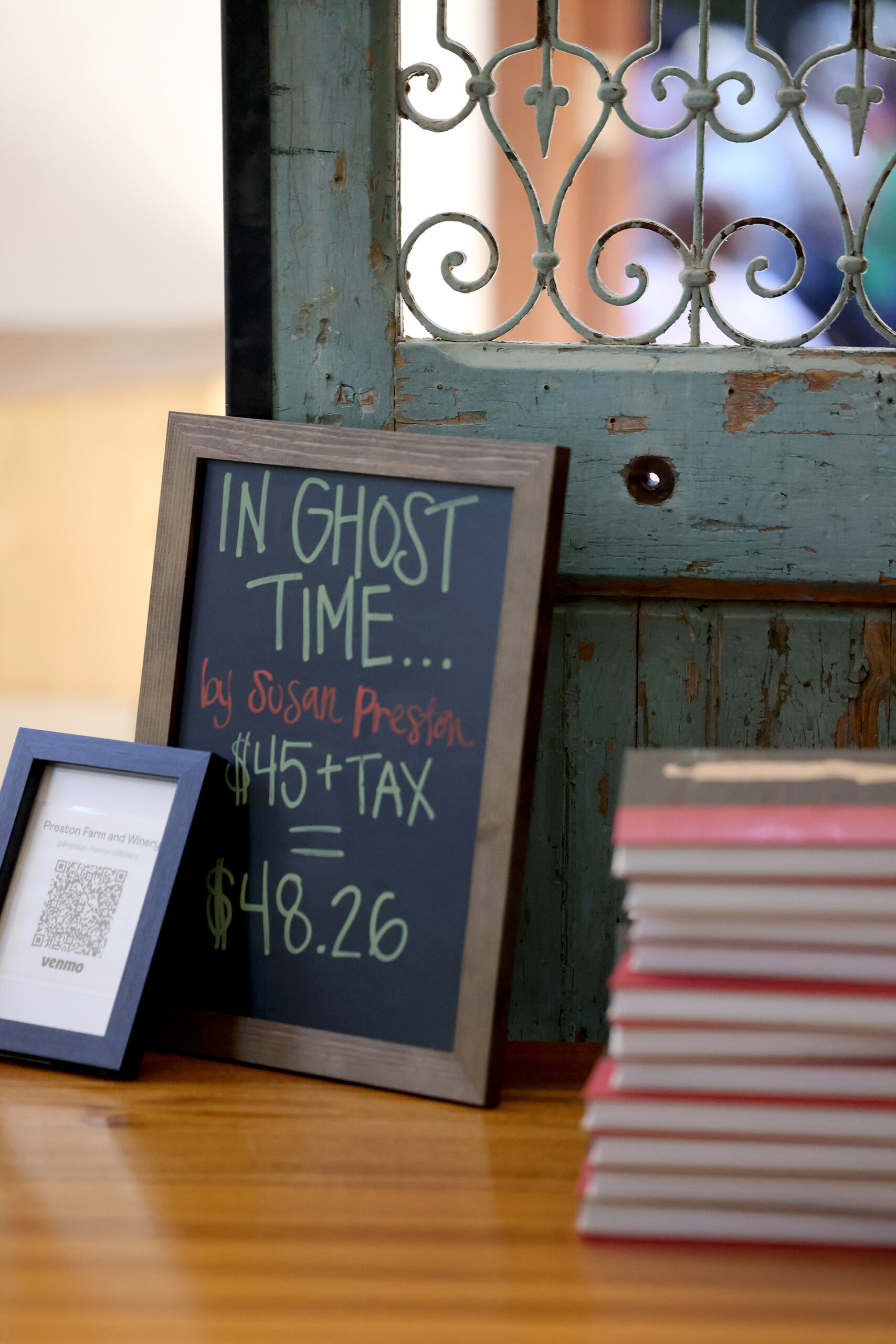 Copies of the book “In Ghost Time: The Art and Stories of Susan Preston” are available for purchase and signing during Preston’s book launch party at Barndiva in Healdsburg Sunday, Sept. 14, 2025. (Beth Schlanker / The Press Democrat)