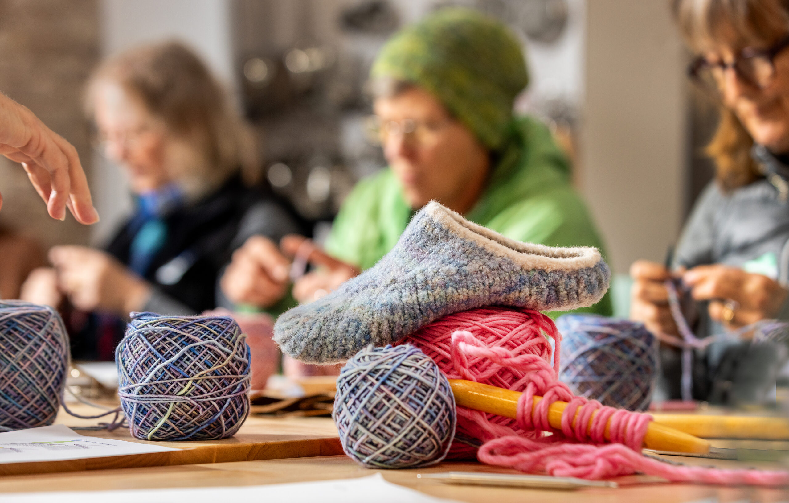 Students learn to make a pair of felted slippers during a class Tuesday Dec. 2, 2025 at Gather in Sebastopol. (John Burgess / The Press Democrat)