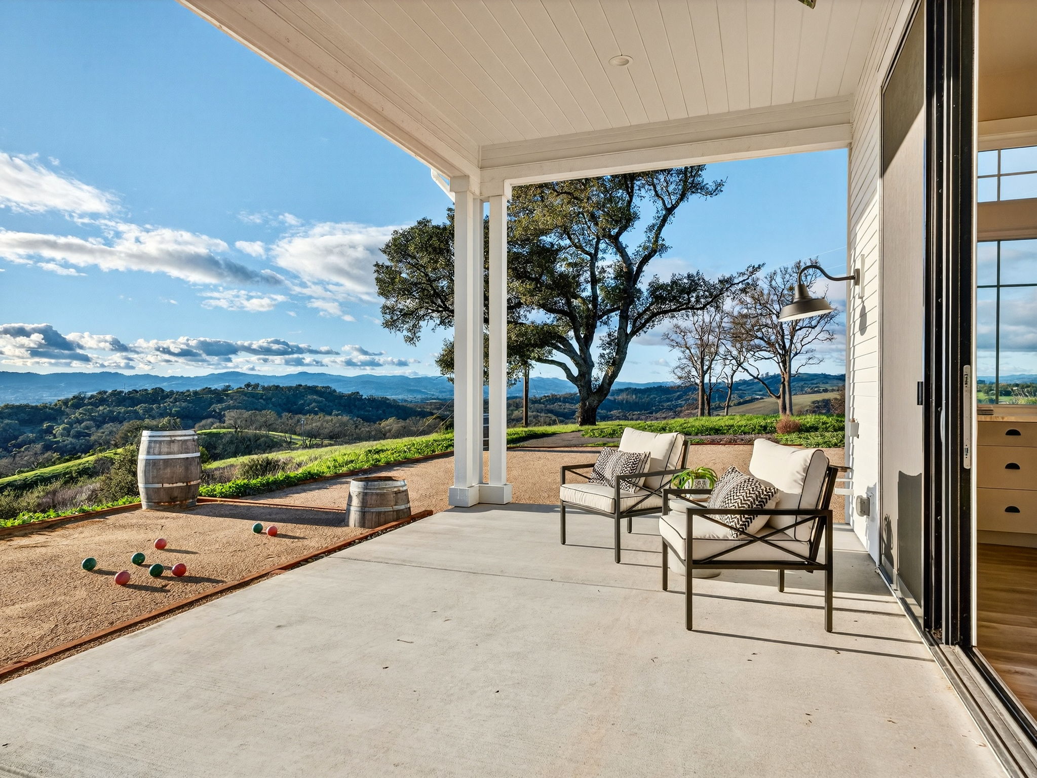Covered patio with bocce court at Healdsburg home