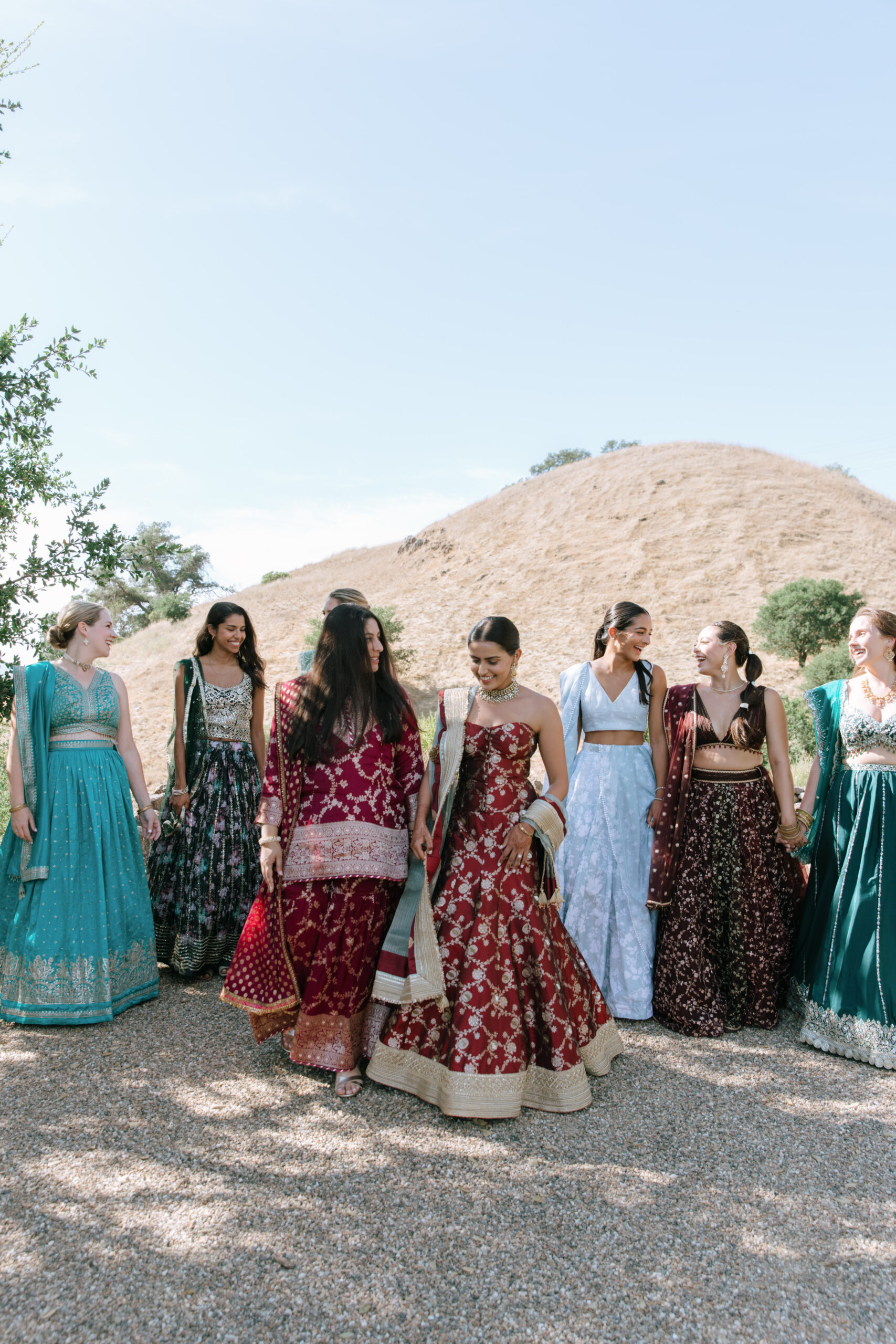 Sanjana dressed in a red dress called a lehenga for her sangeet. (Katie Miller)