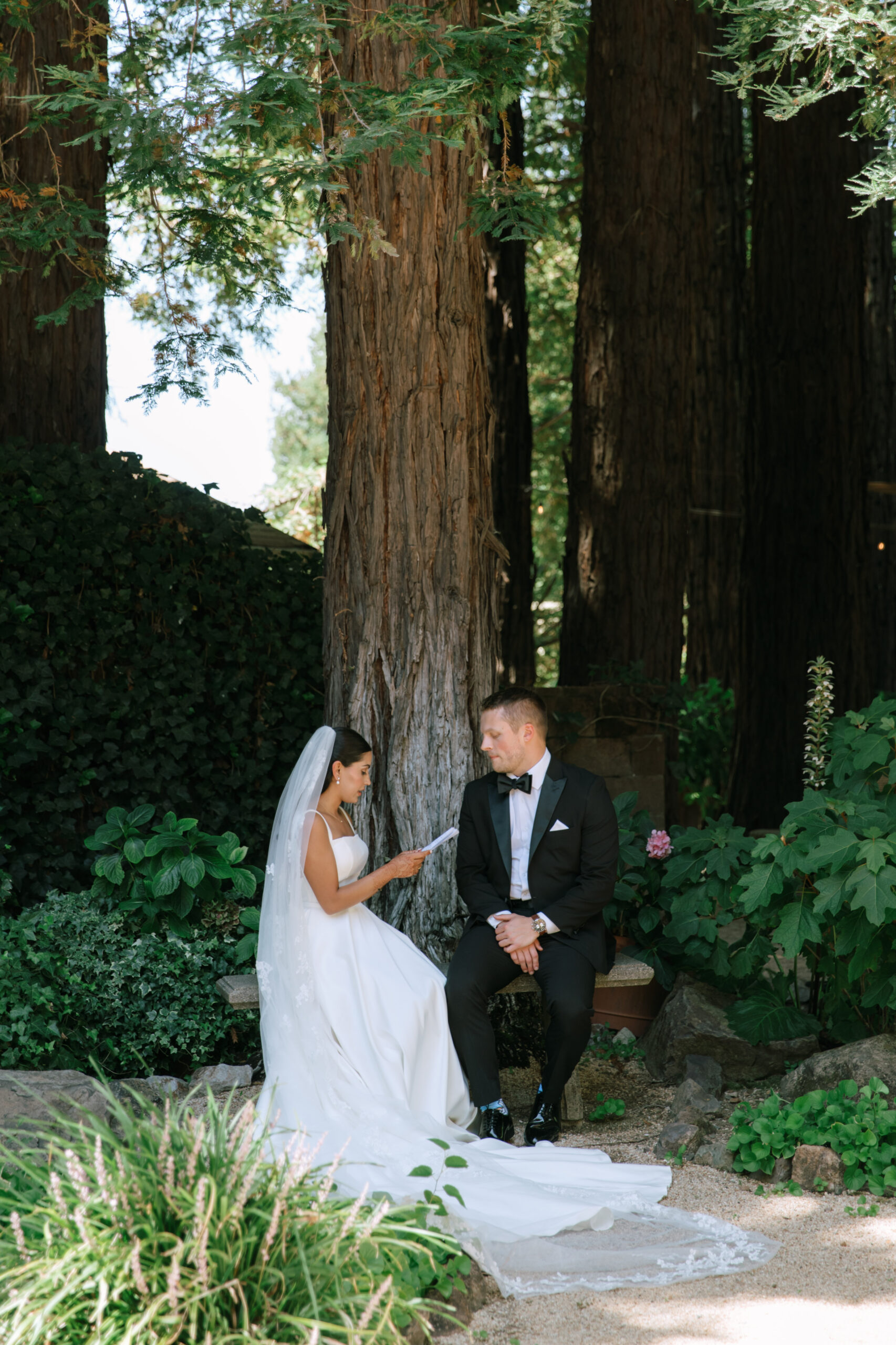 Sanjana and Evan's wedding took place at Trentadue Winery in Geyserville. Before standing in front of all their guests, the couple took part in a “First Look” ceremony in which they exchanged private vows beneath a stately grove of redwoods. (Katie Miller)