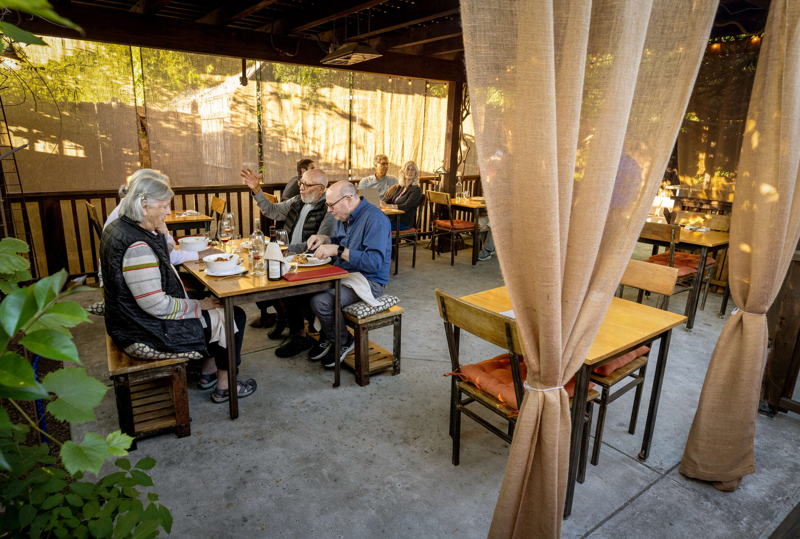 Summertime outdoor seating in the back patio at Canneti Roadhouse Italiana Monday, June 9, 2025 in Forestville. (John Burgess / The Press Democrat)