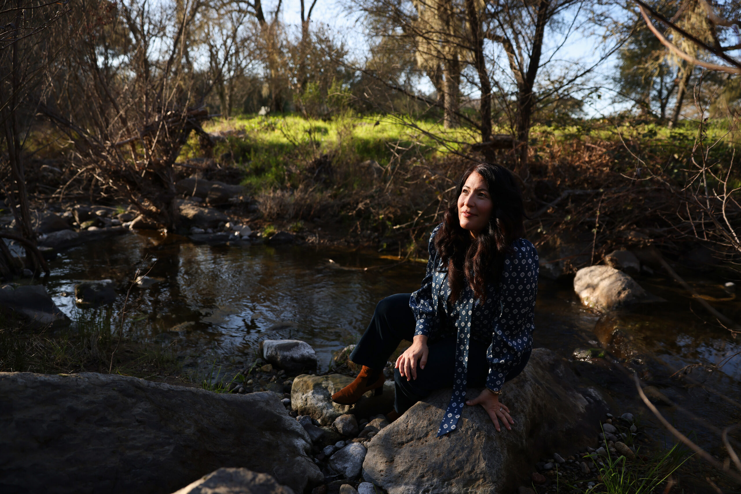 Poet Ada Limón shares one of her favorite spots to hang out, a creek near her home in Glen Ellen on Wednesday, February 4, 2026. (Christopher Chung/The Press Democrat)