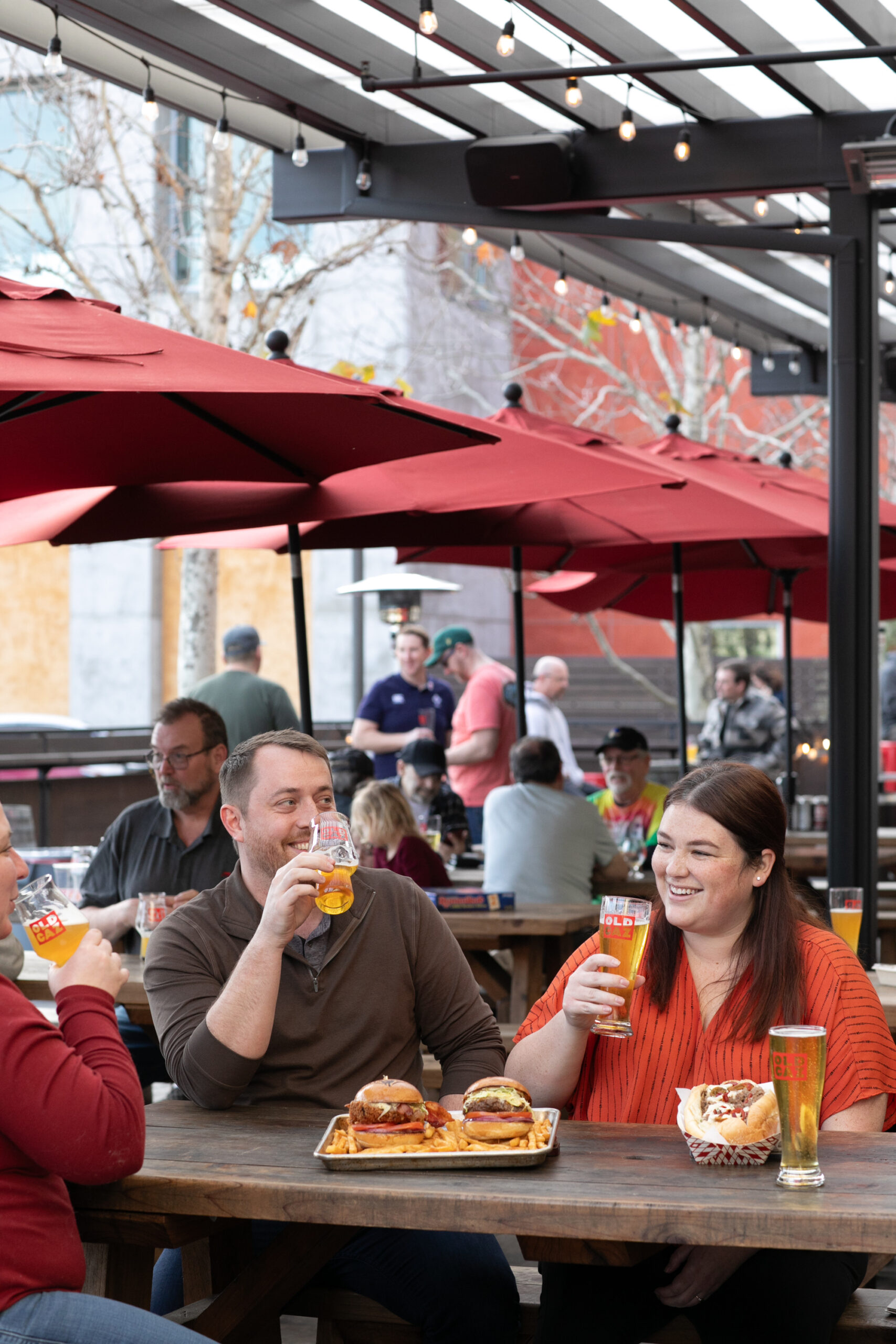 Patrons enjoy an afternoon on the patio at Old Caz Beer in Rohnert Park. 