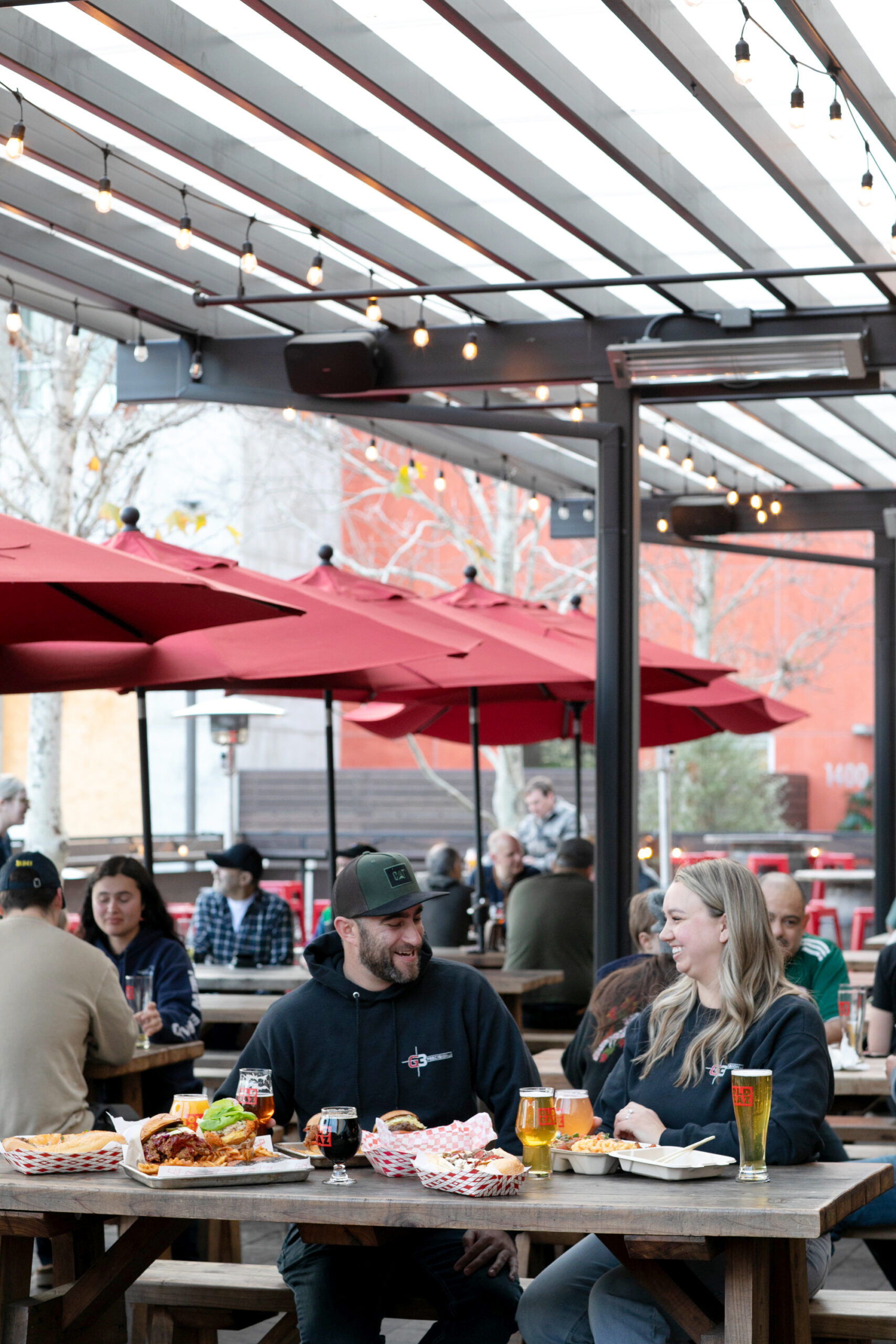 Patrons enjoy an afternoon on the patio at Old Caz Beer in Rohnert Park. 