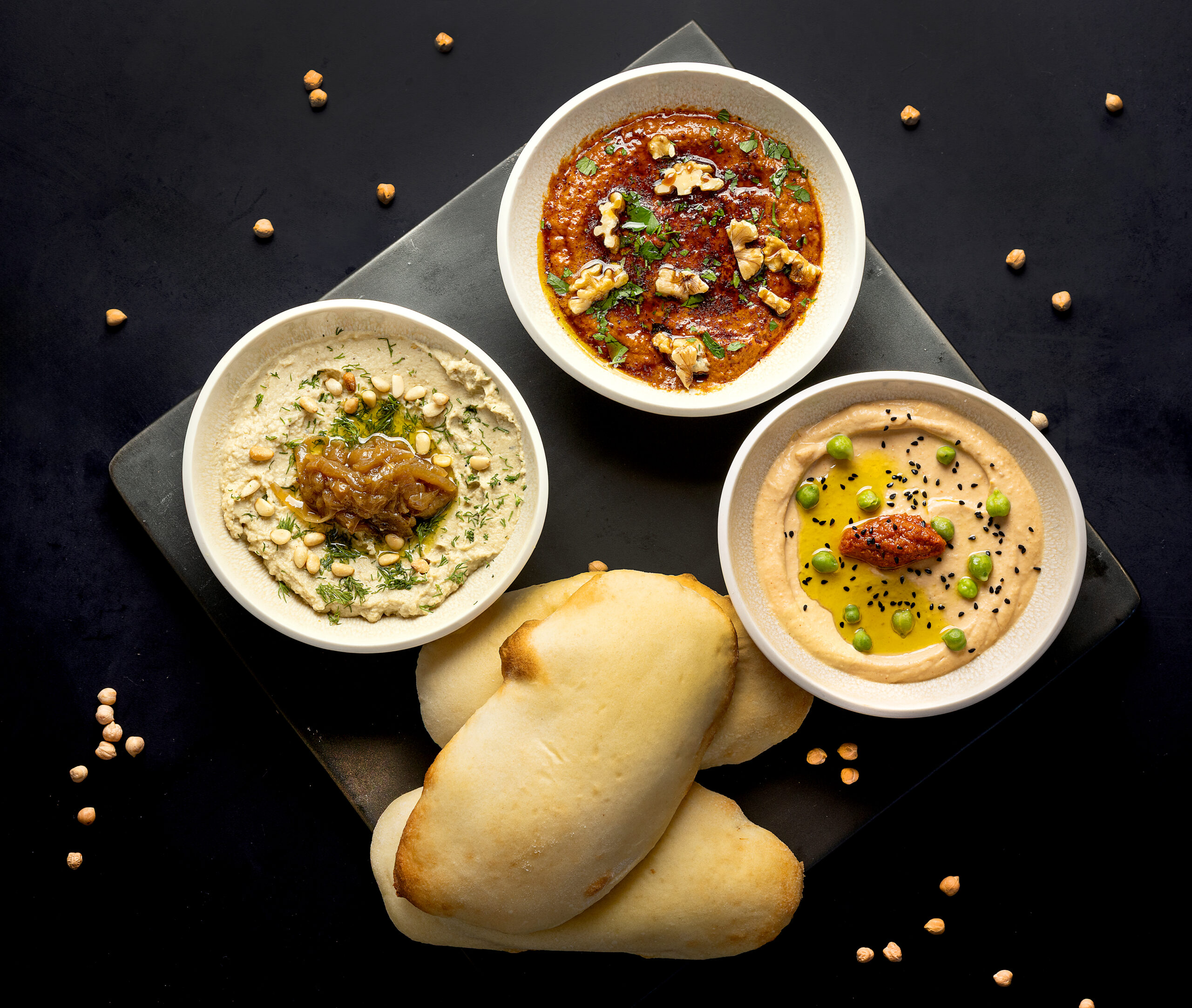 The Mezzo Trio with hummus, muhammara and baba ghanoush from Juju’s, a French-Moroccan dinner pop-up in the Acorn Café space on the square in Healdsburg. 