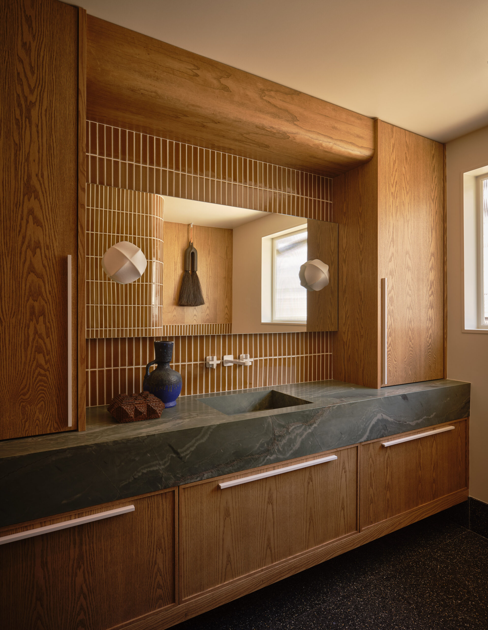 San Francisco firm Aubrey Maxwell designed this bathroom vanity featuring ochre finger tiles from McIntyre Tile. (Brad Knipstein Photography)