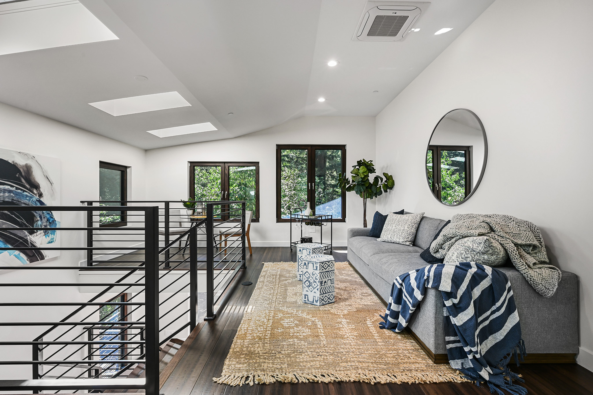 Lounge area on top-level landing in Rio Nido home