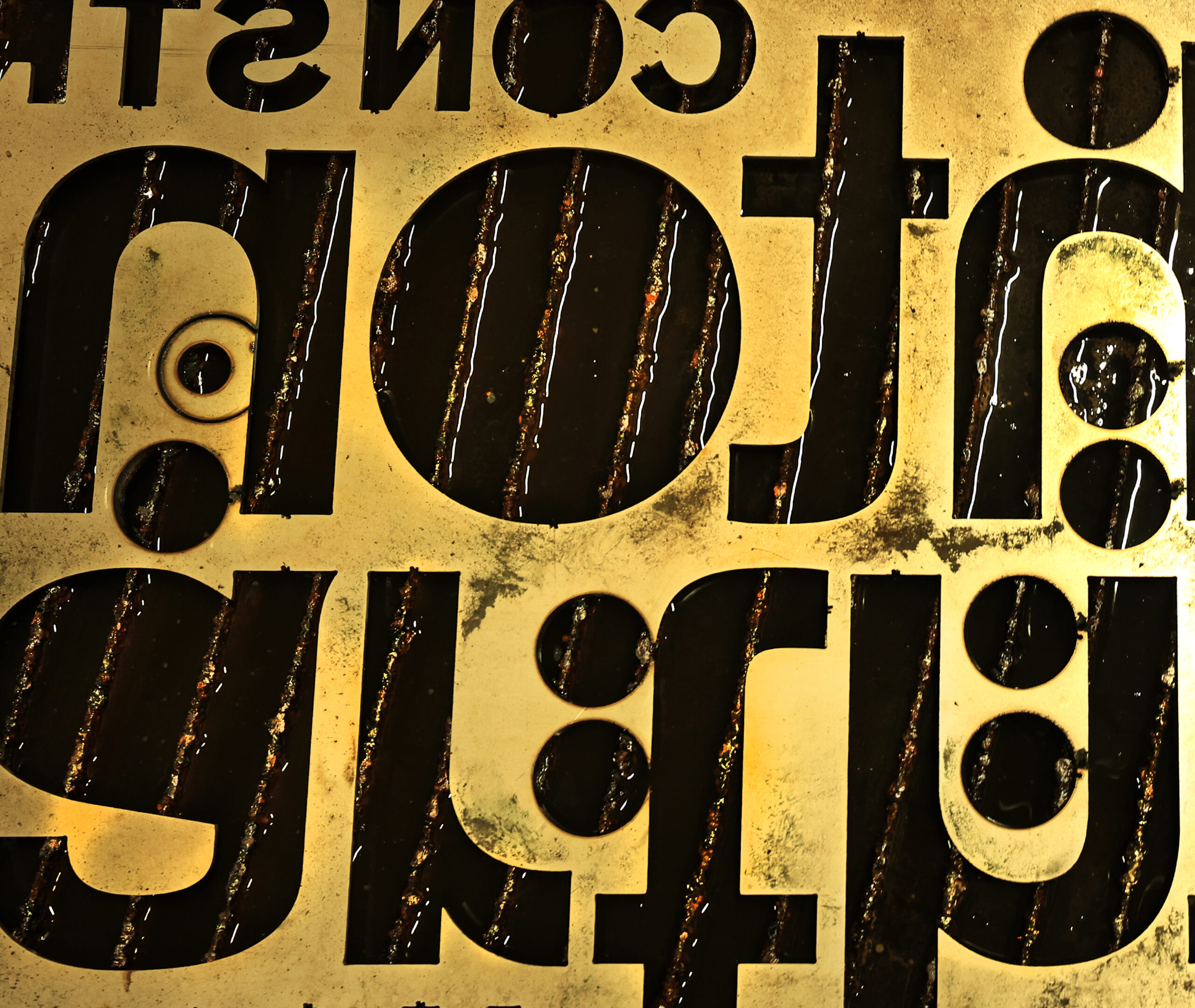 Wording for a sign carved out by a plasma cutter at Schnitzkraft Steel Artistry in Santa Rosa, Tuesday, Feb.10, 2026. (Kent Porter / The Press Democrat)