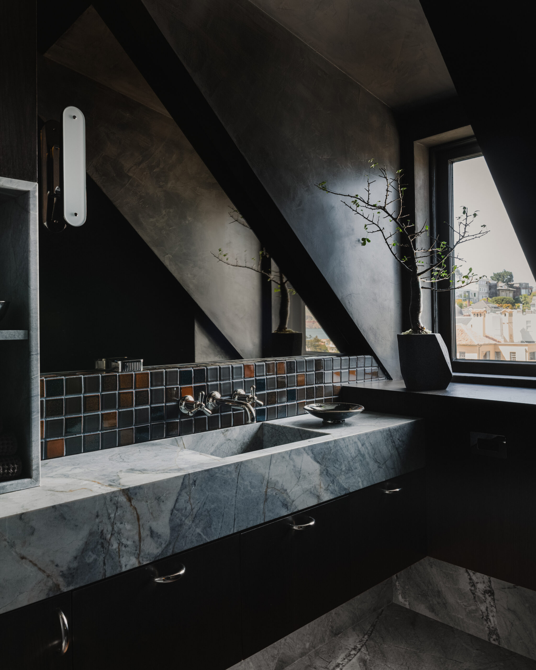 This moody bathroom overlooks “the greatest view in the world” according to Nikban. (Dane Deaner)
