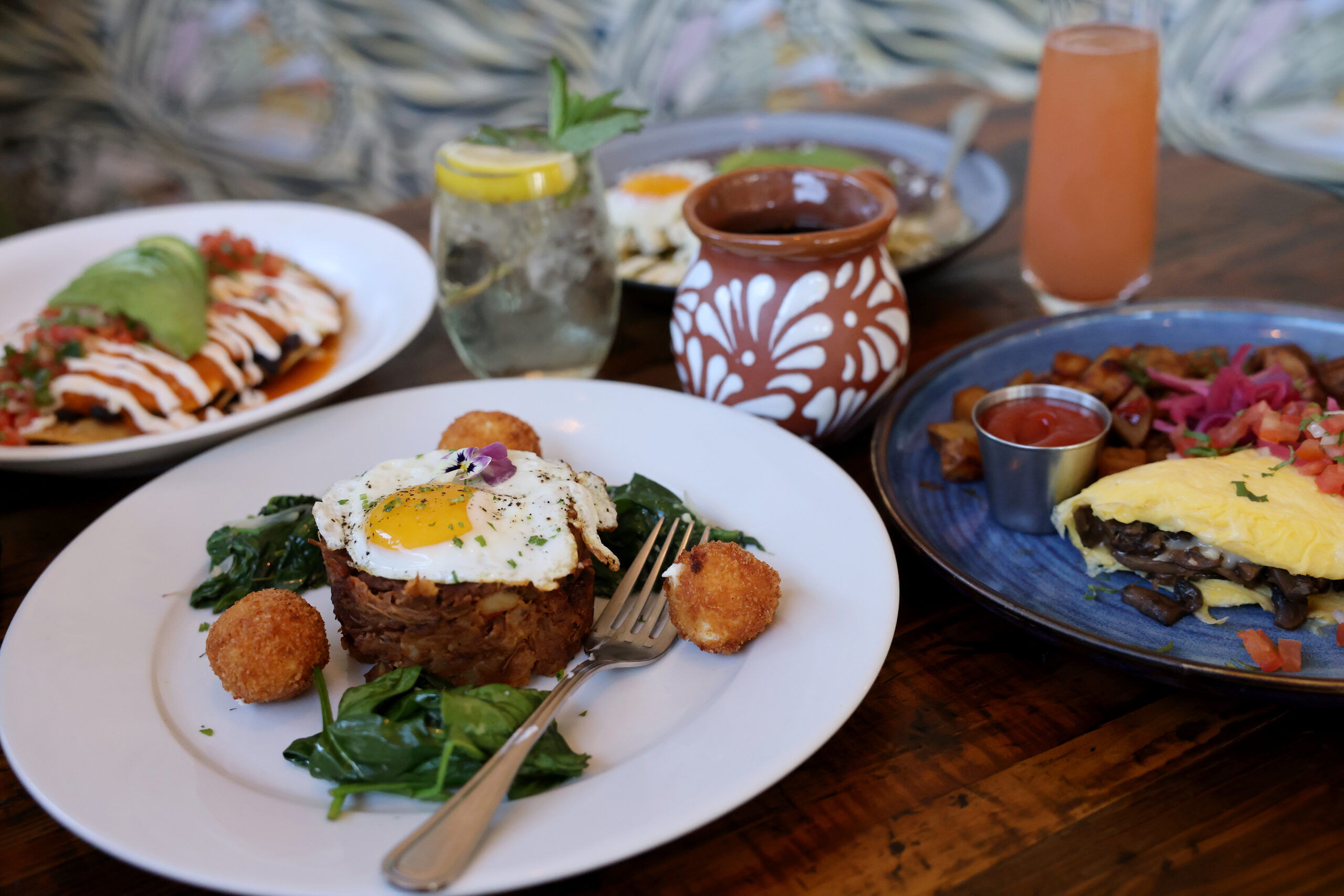 Birria hash with fried eggs, spinach and goat cheese balls at Parkside Eats in Santa Rosa Monday, April 13, 2026. (Beth Schlanker / The Press Democrat)