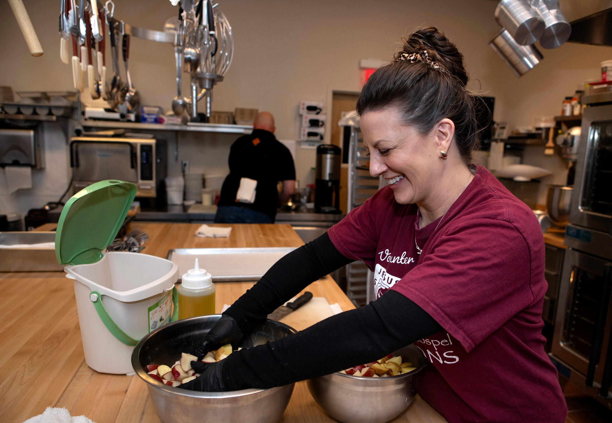 Volunteer, Robin Pistorio of Santa Rosa, makes potato salad in the kitchen at the new Redwood Gospel Baking Company cafe in Santa Rosa, Friday, April 10, 2026. (Darryl Bush/For The Press Democrat)