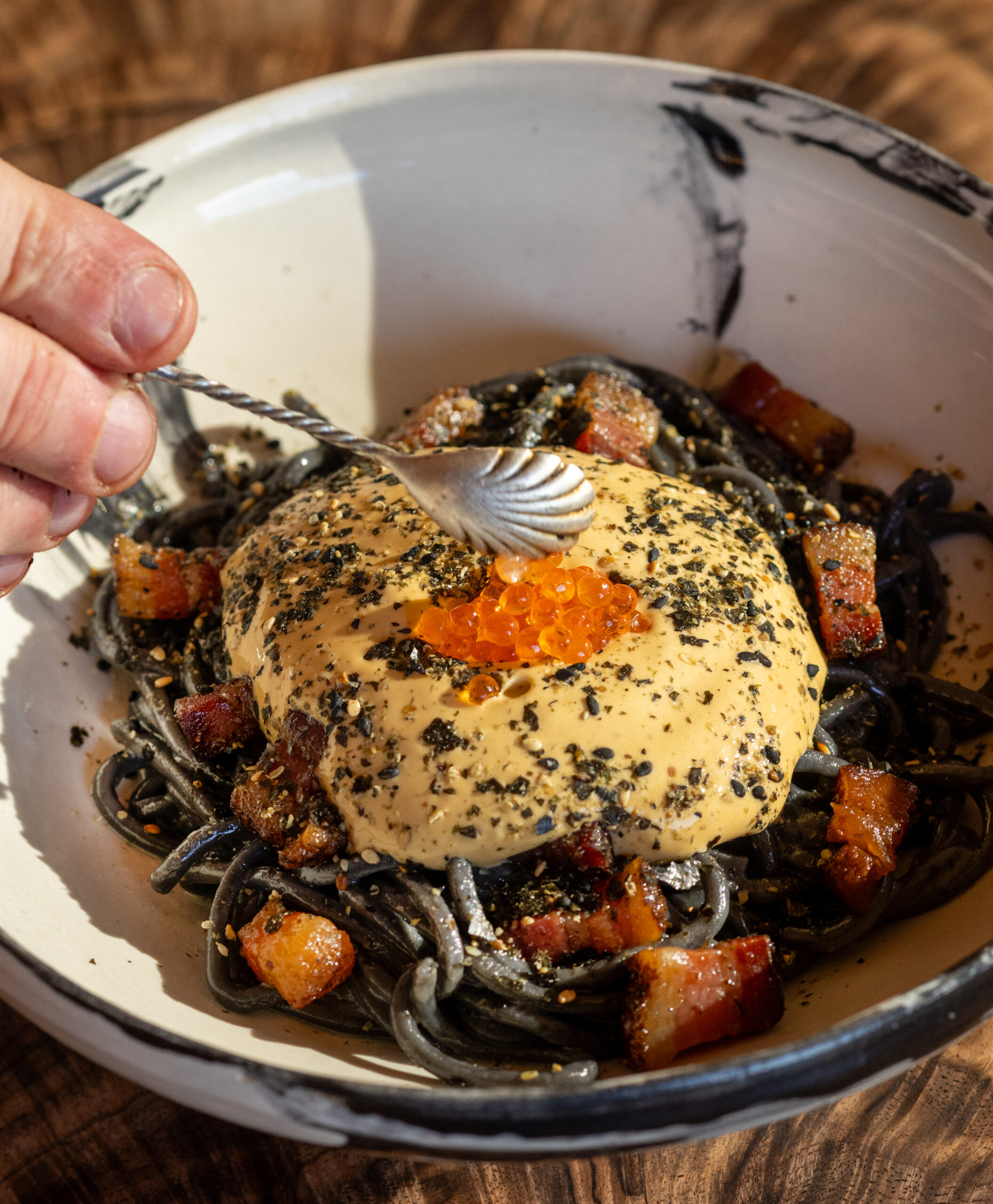 Uni Carbonara with squid ink chimaera pasta, pancetta, furikake and the uni from local purple sea urchins