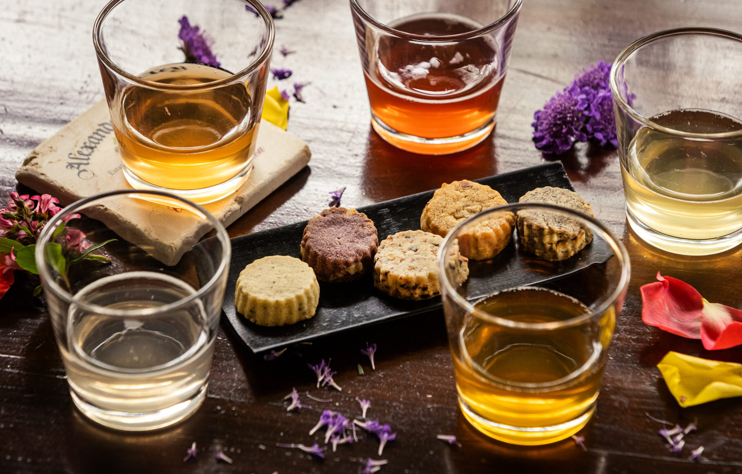 For the designated driver Alexander Valley Vineyards culinary director Tim Gleadall pairs nonalcoholic shrubs with flavored shortbreads for the “Wine and Cookie Pairing Experience” Wednesday, April 22, 2026. (John Burgess/The Press Democrat)
