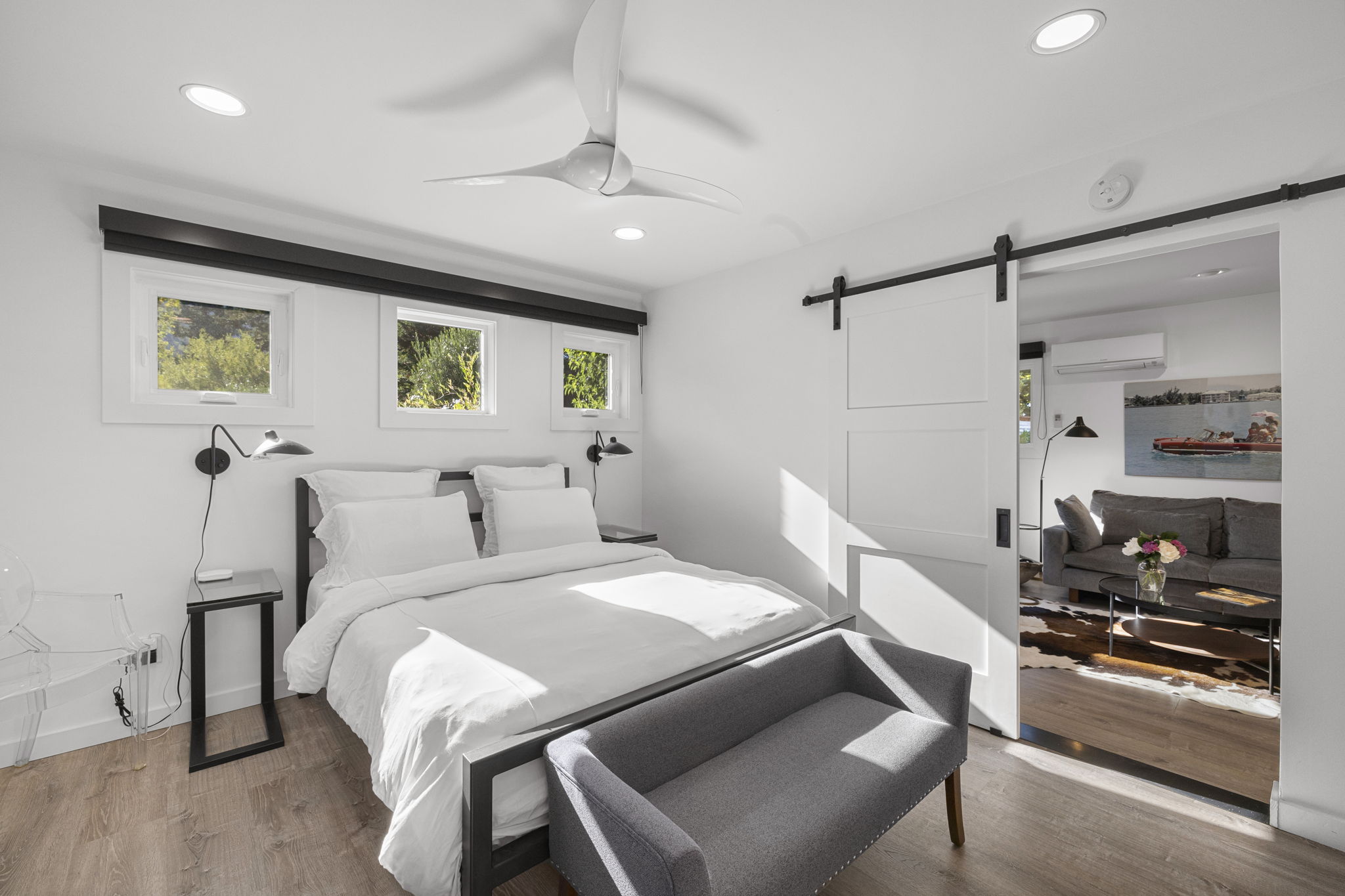 Bedroom and living room in ADU. (Agent Stack)
