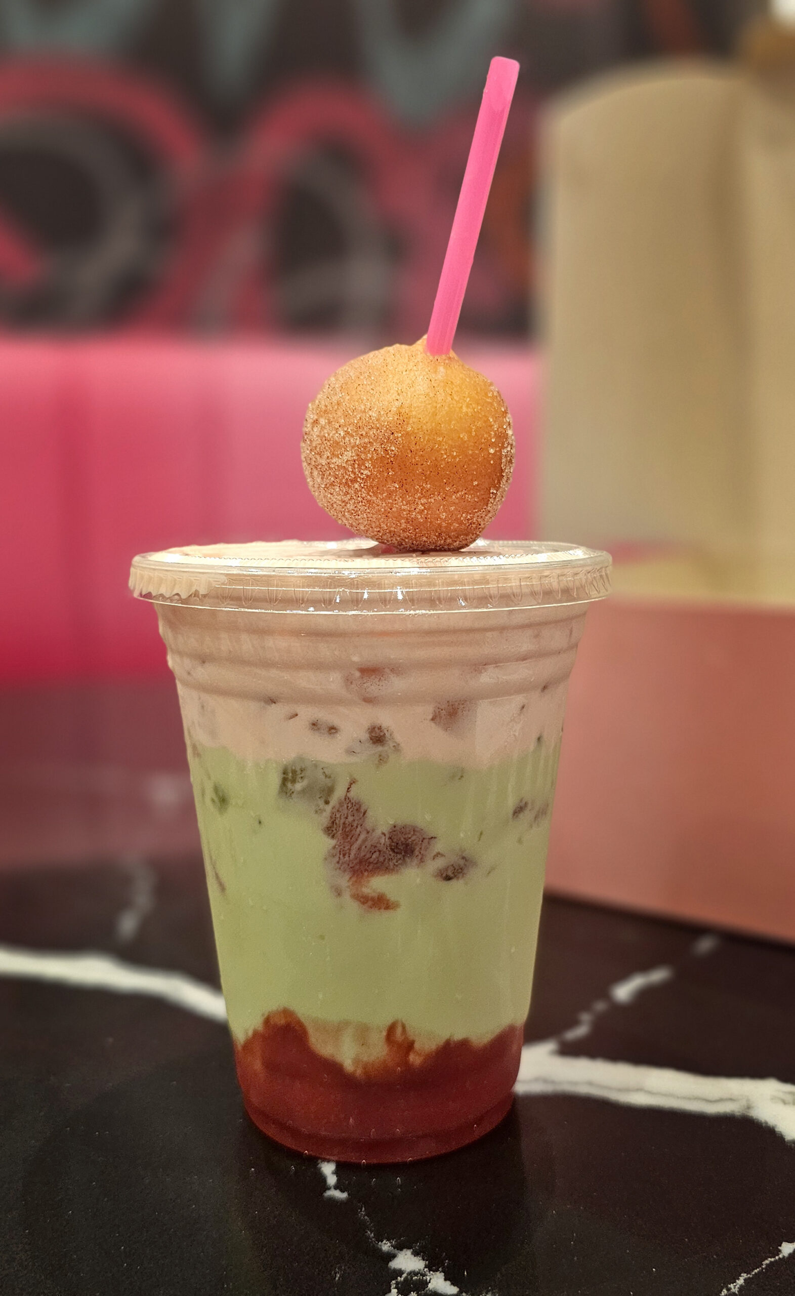 Berry Zen dessert milk at SoCo Dough Co. at Graton Resort & Casino is made with strawberry puree, matcha and strawberry chantilly. (Heather Irwin / The Press Democrat)