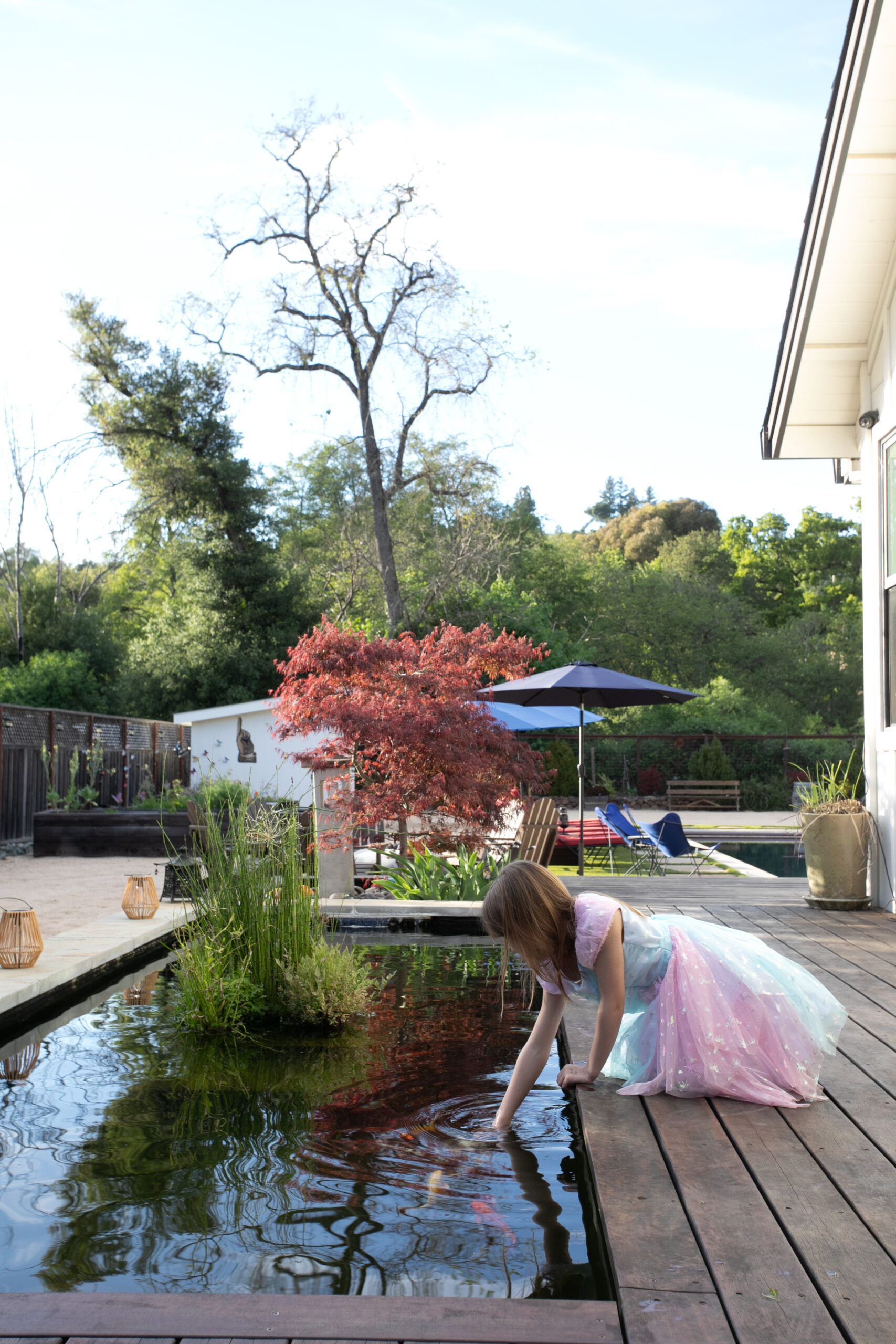 The koi pond offers guests a quiet, reflective space. (Eileen Roche)