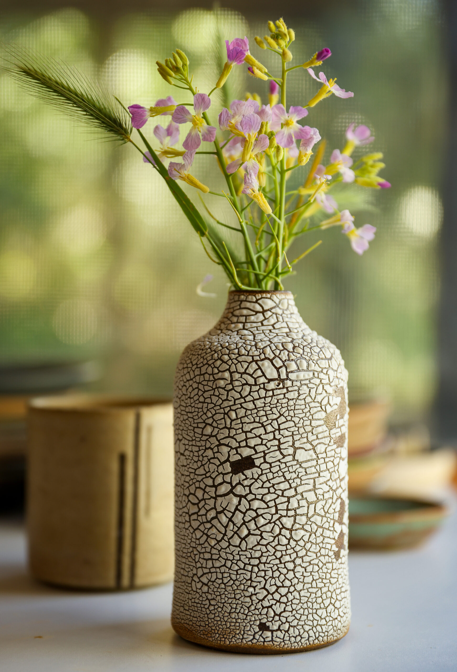 A crackle ceramic vase made by Hannah Allen in Santa Rosa