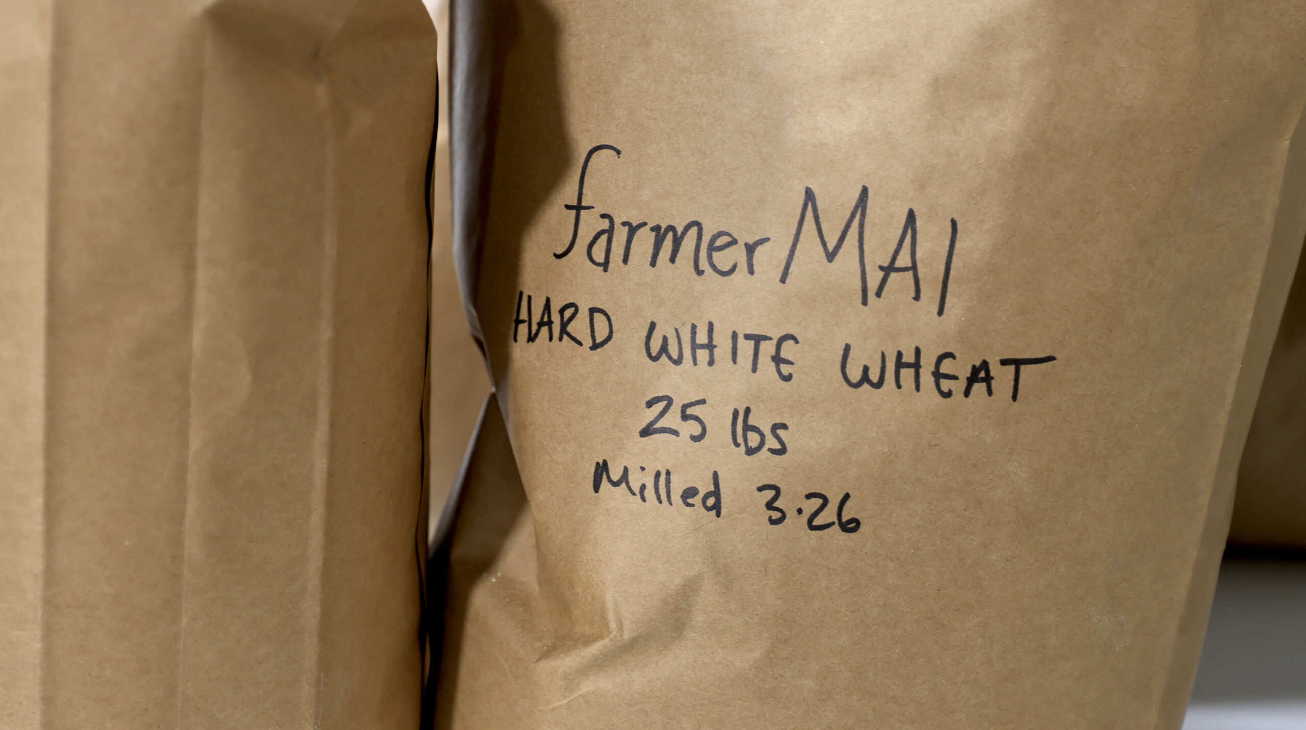 Hard white wheat, seeded by hand and grown by Mai Nguyen is milled and bagged at Green Valley Farm and Mill in west Sonoma County