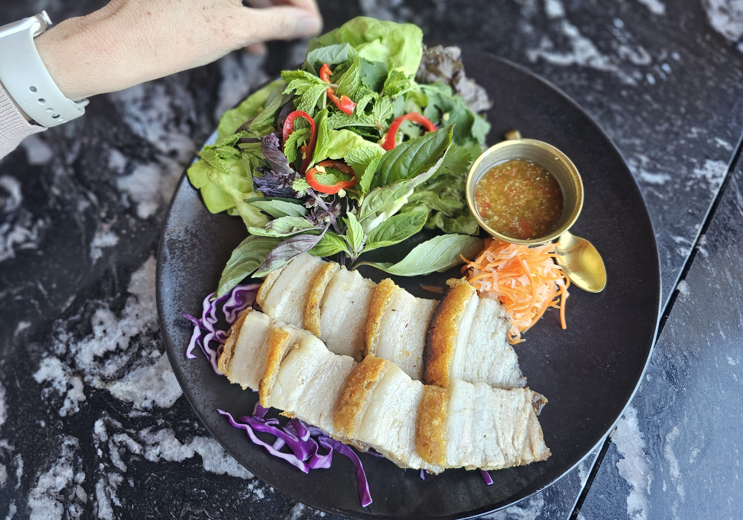 Pork belly lechon from AYA Sonoma at the Graton Resort & Casino in Rohnert Park. (Heather Irwin / The Press Democrat)