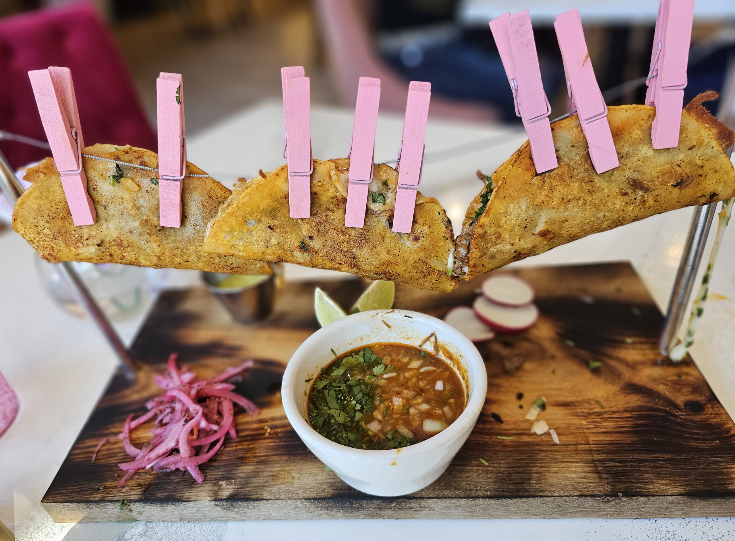 Birria on a trapeze at Carrusel in Santa Rosa. A tasty high-wire act. (Heather Irwin / The Press Democrat)
